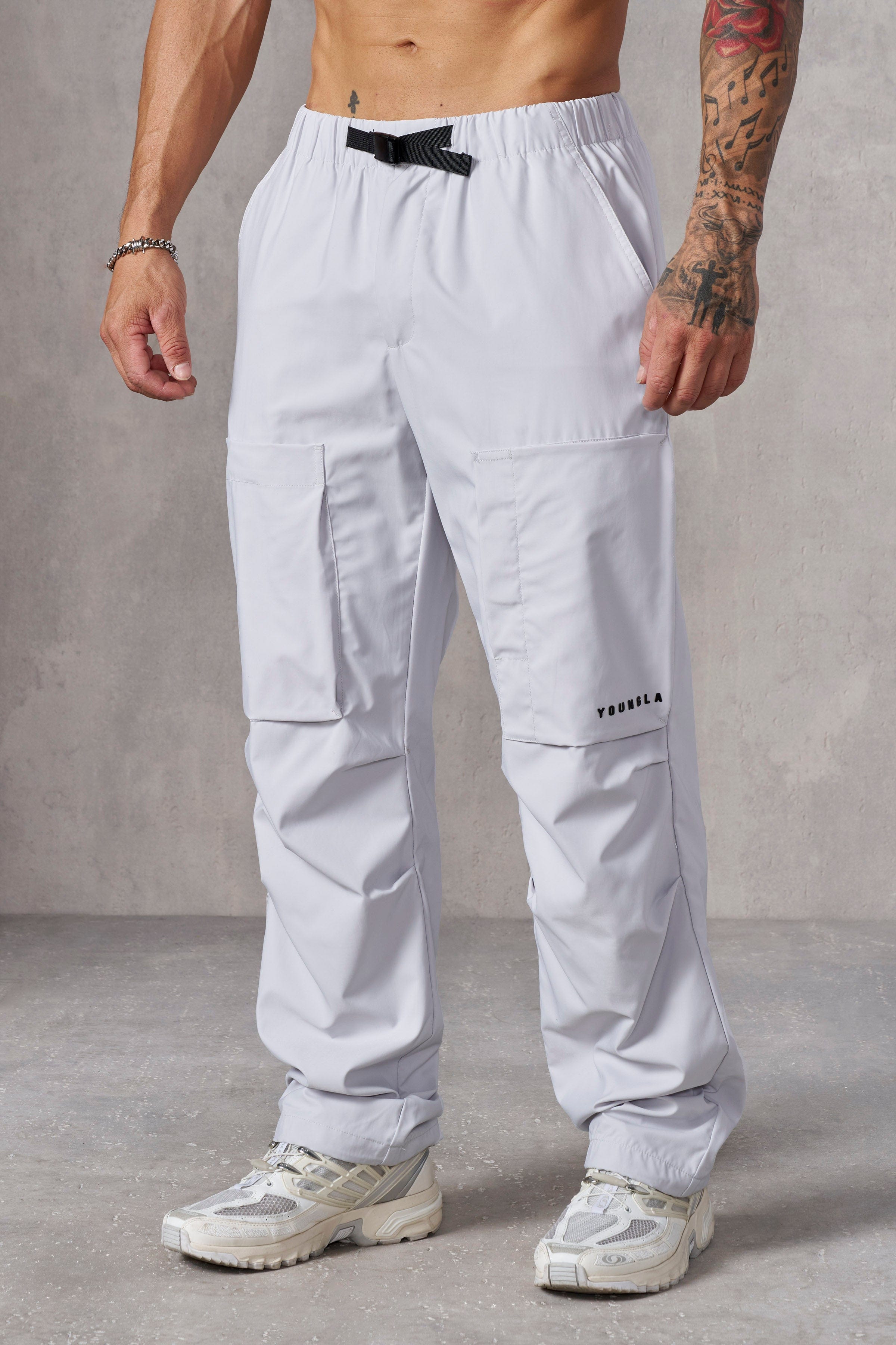 Close-up of Terrain waterproof pants showing adjustable waist strap