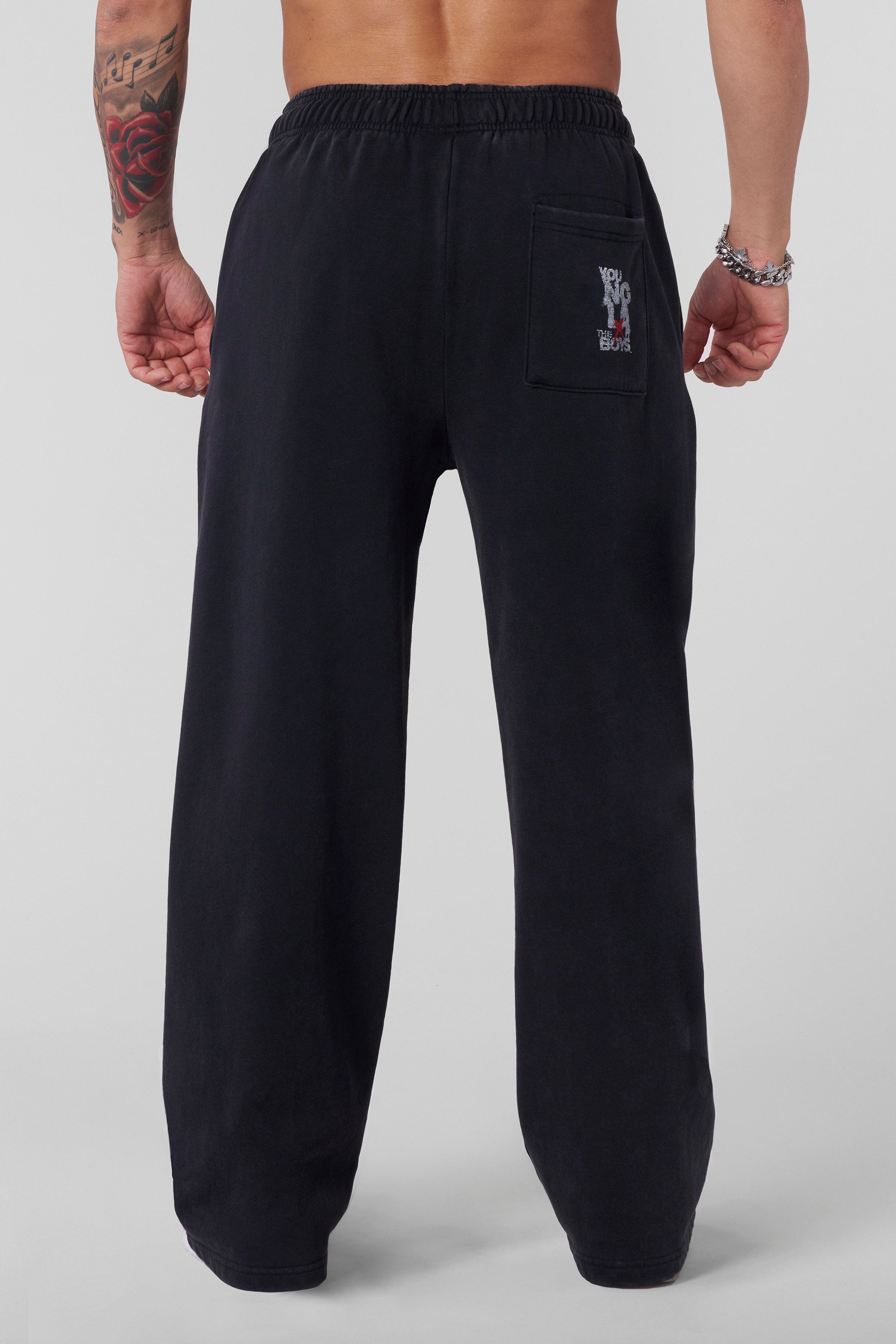 Savage Graphic Sweats displayed on a model, emphasizing the baggy fit.