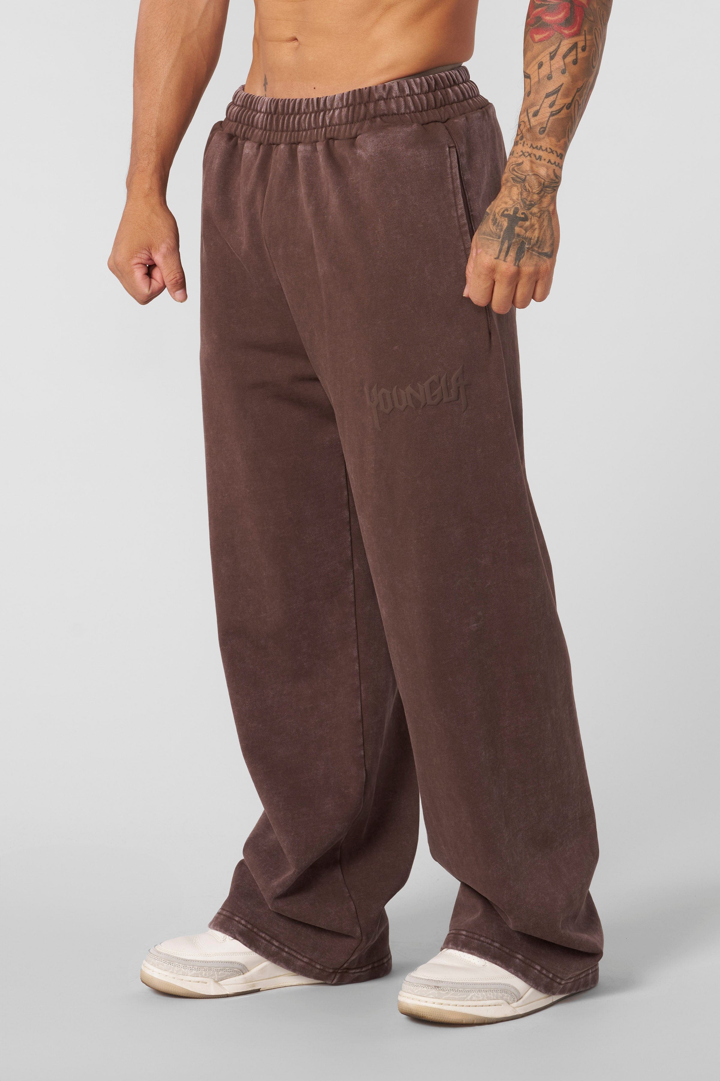 Close-up of vintage washed black joggers with no-cuff bottom, perfect for casual wear
