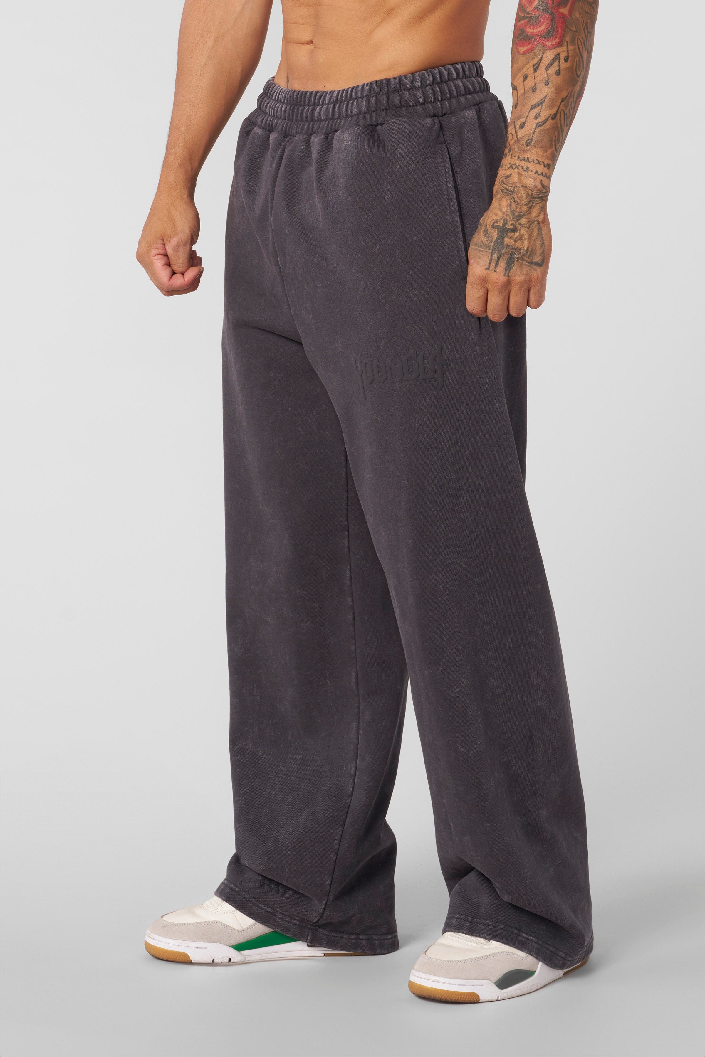 Close-up of vintage washed black joggers with no-cuff bottom, perfect for casual wear