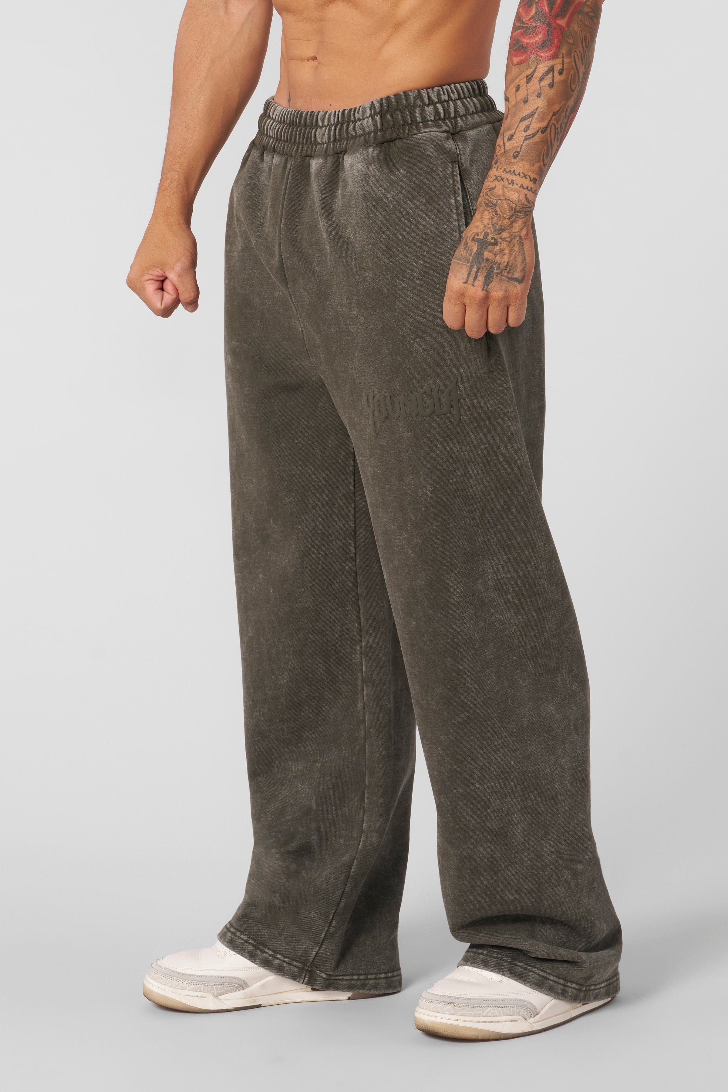 Front view of relaxed fit joggers highlighting the tonal logo and vintage look