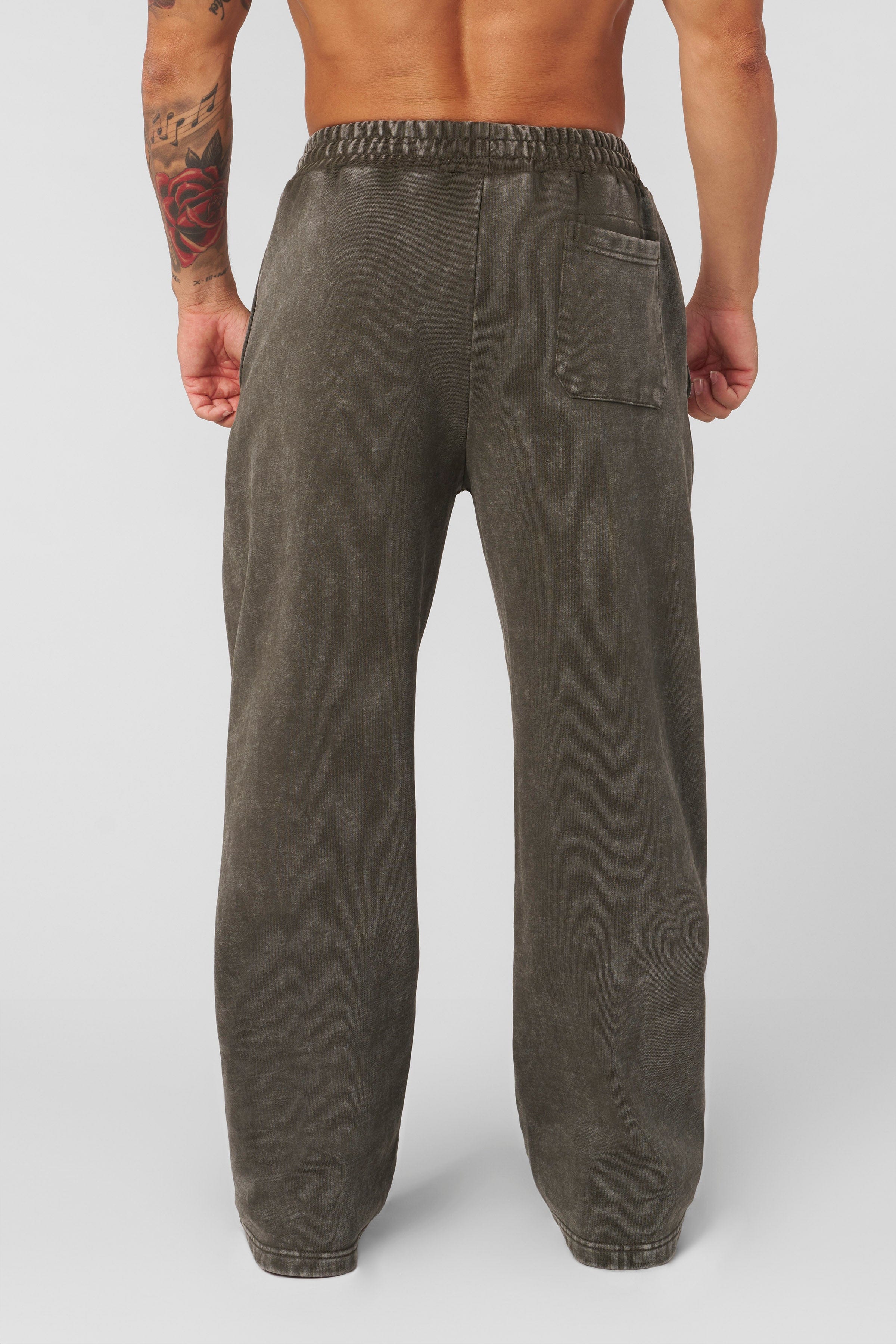 Front view of relaxed fit joggers highlighting the tonal logo and vintage look