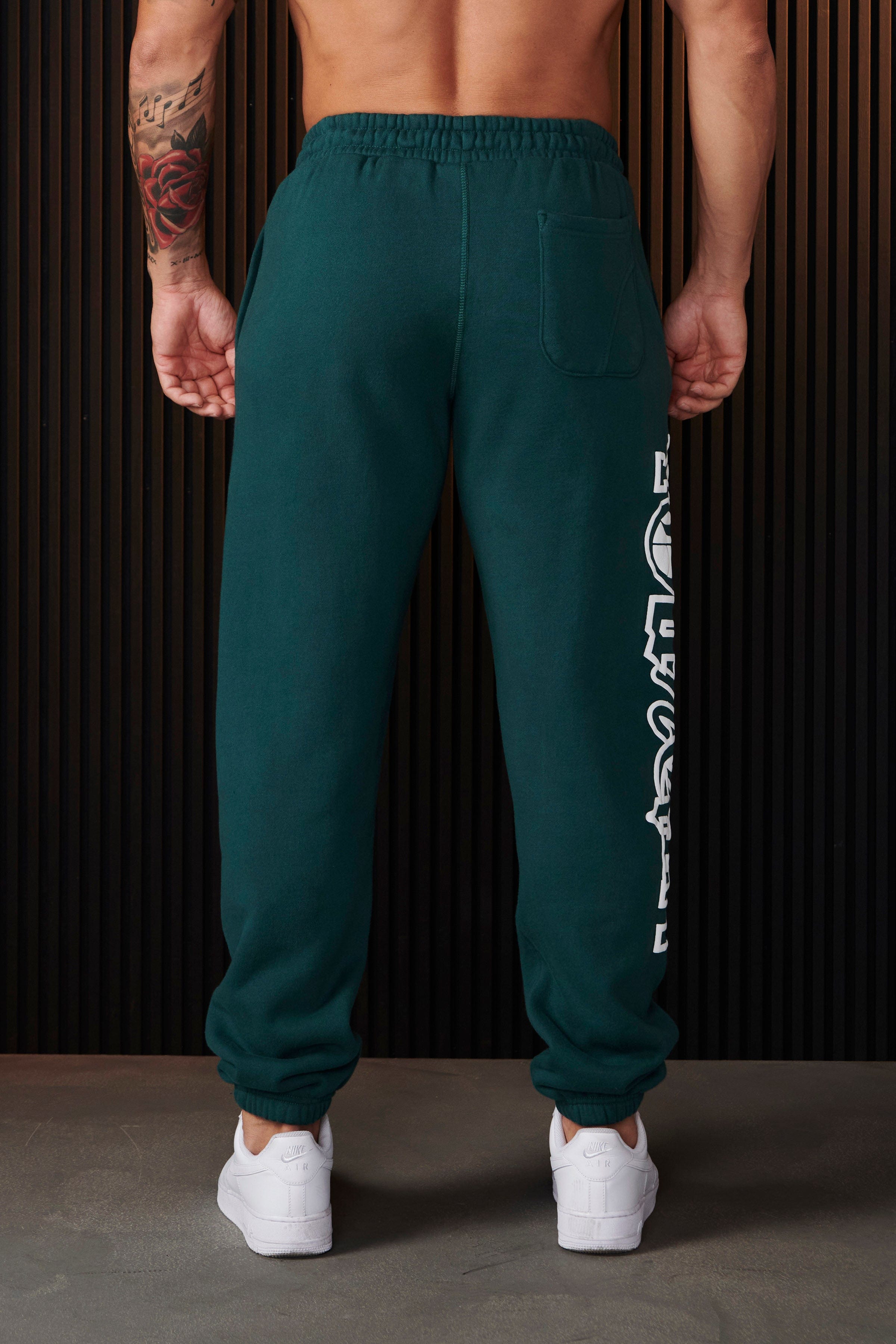 Model wearing relaxed-fit joggers for women, casual streetwear look