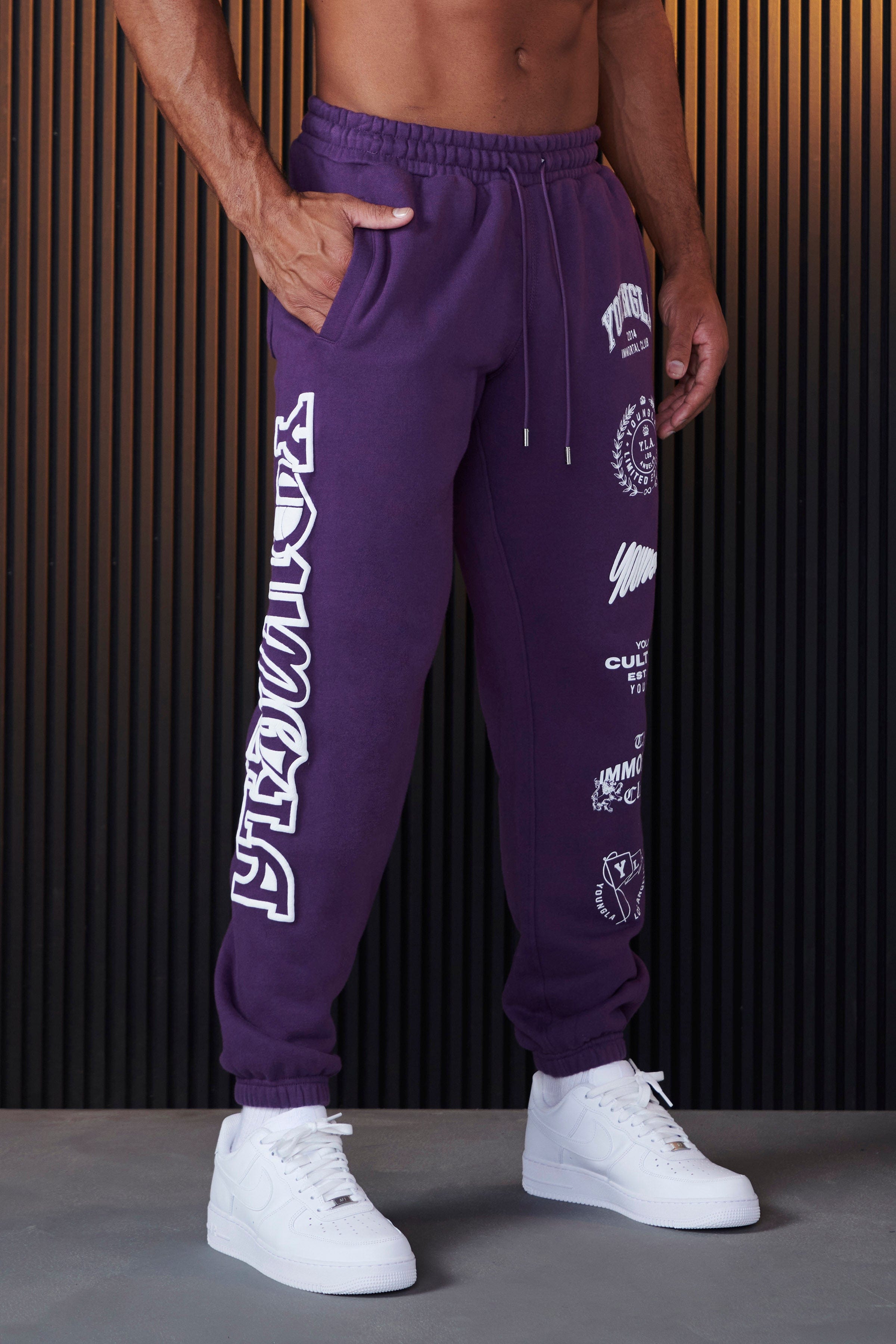 Close-up of the puff printed graphic on black joggers, Japanese streetwear influence