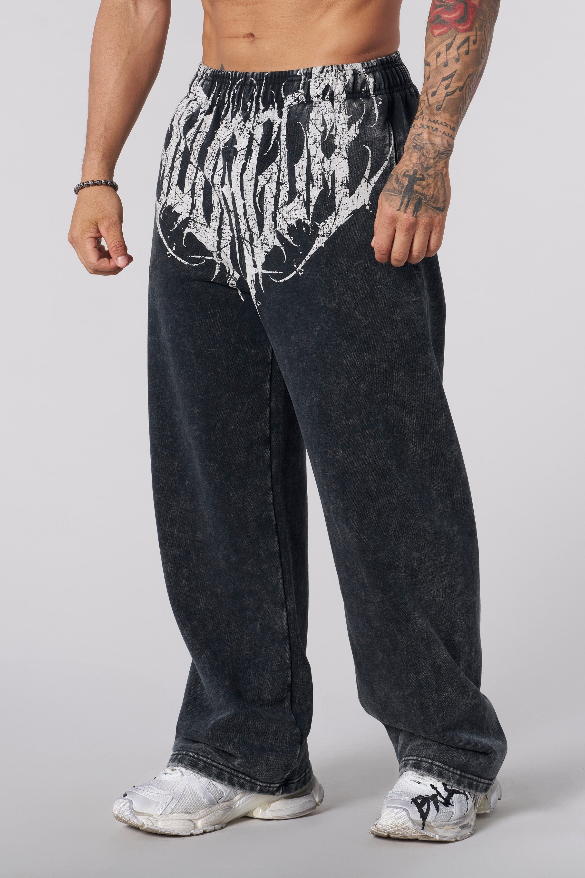 Dark Wave Joggers front view showing tribal graphic detail