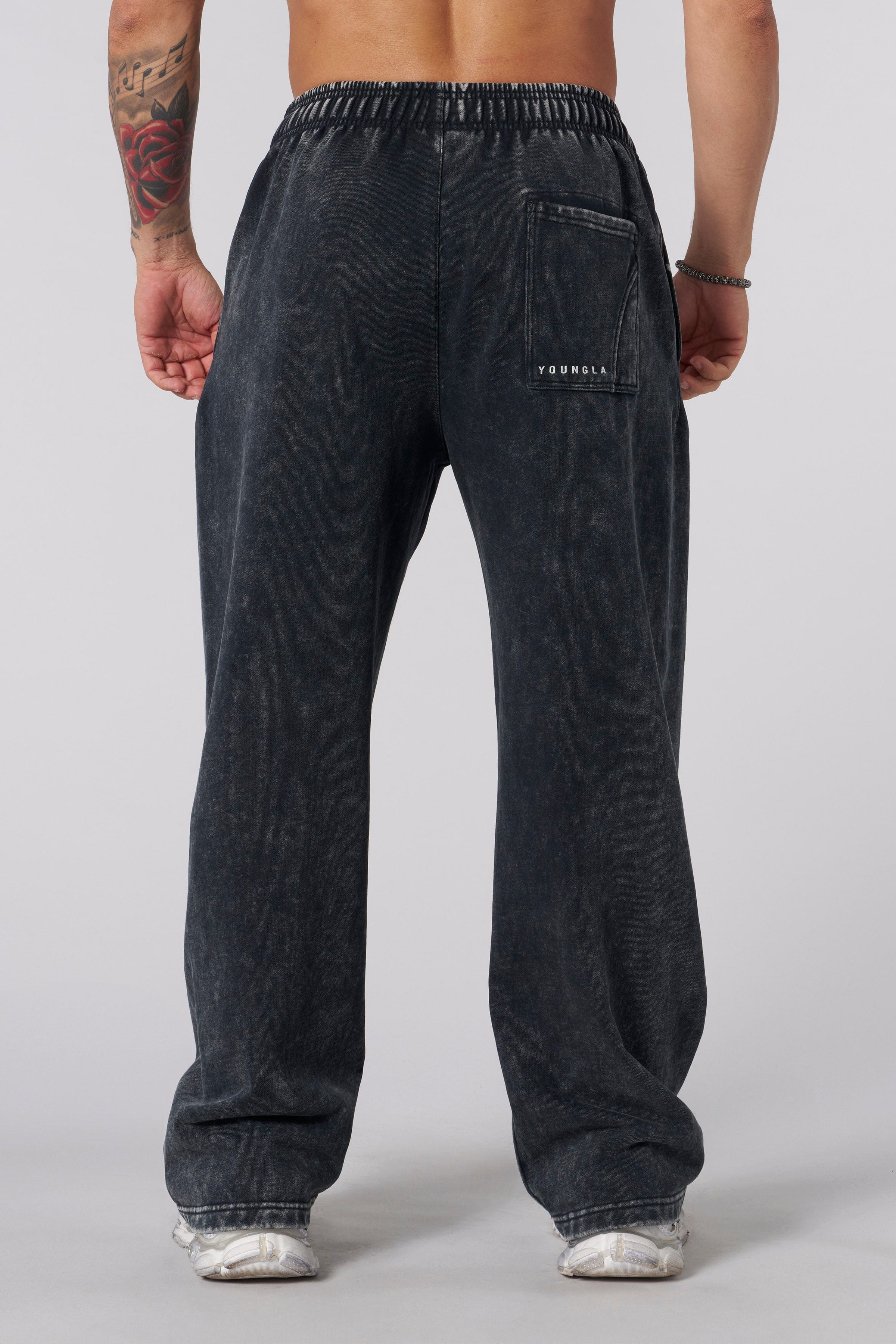 Dark Wave Joggers front view showing tribal graphic detail