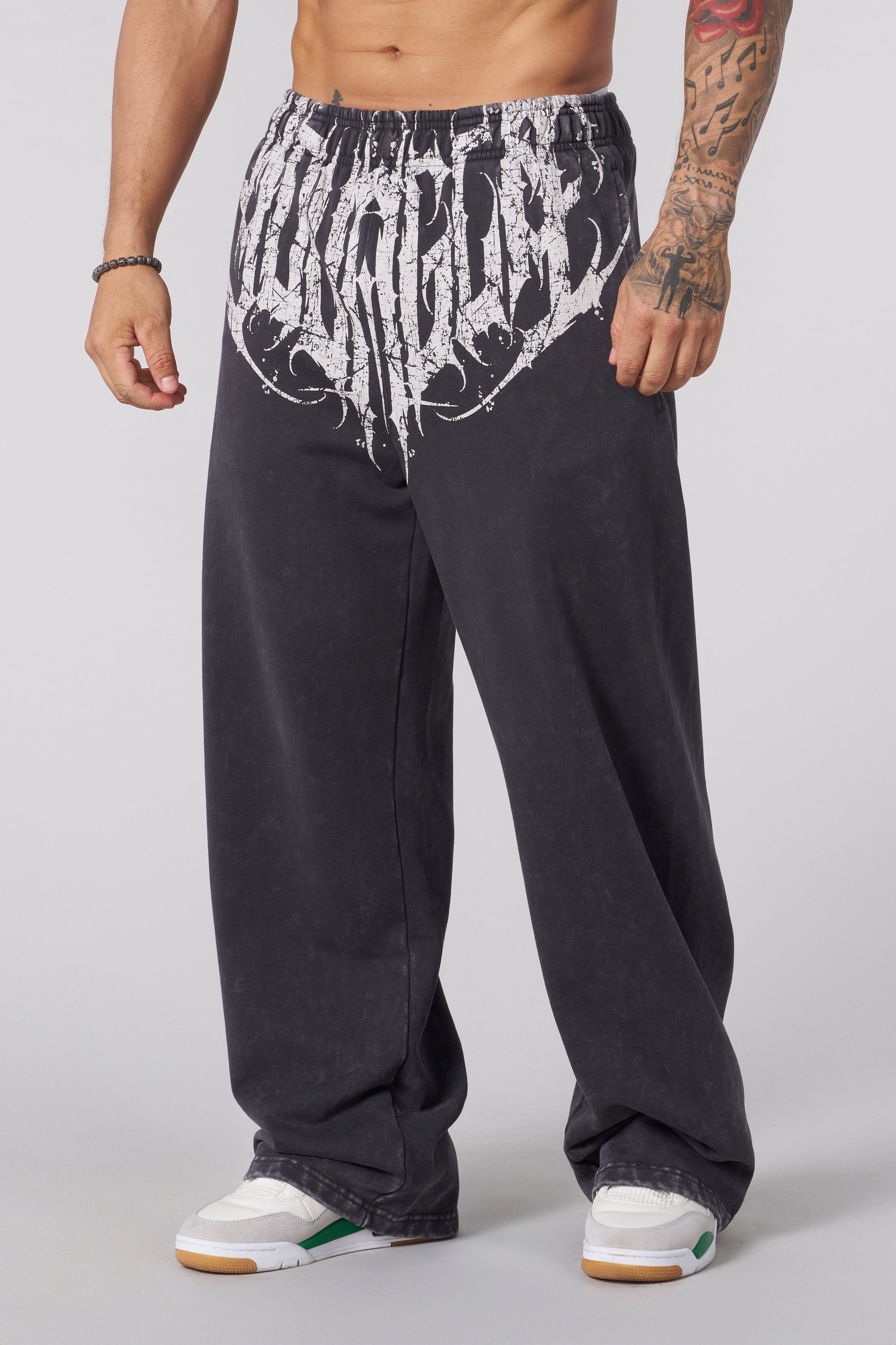 Dark Wave Joggers front view showing tribal graphic detail