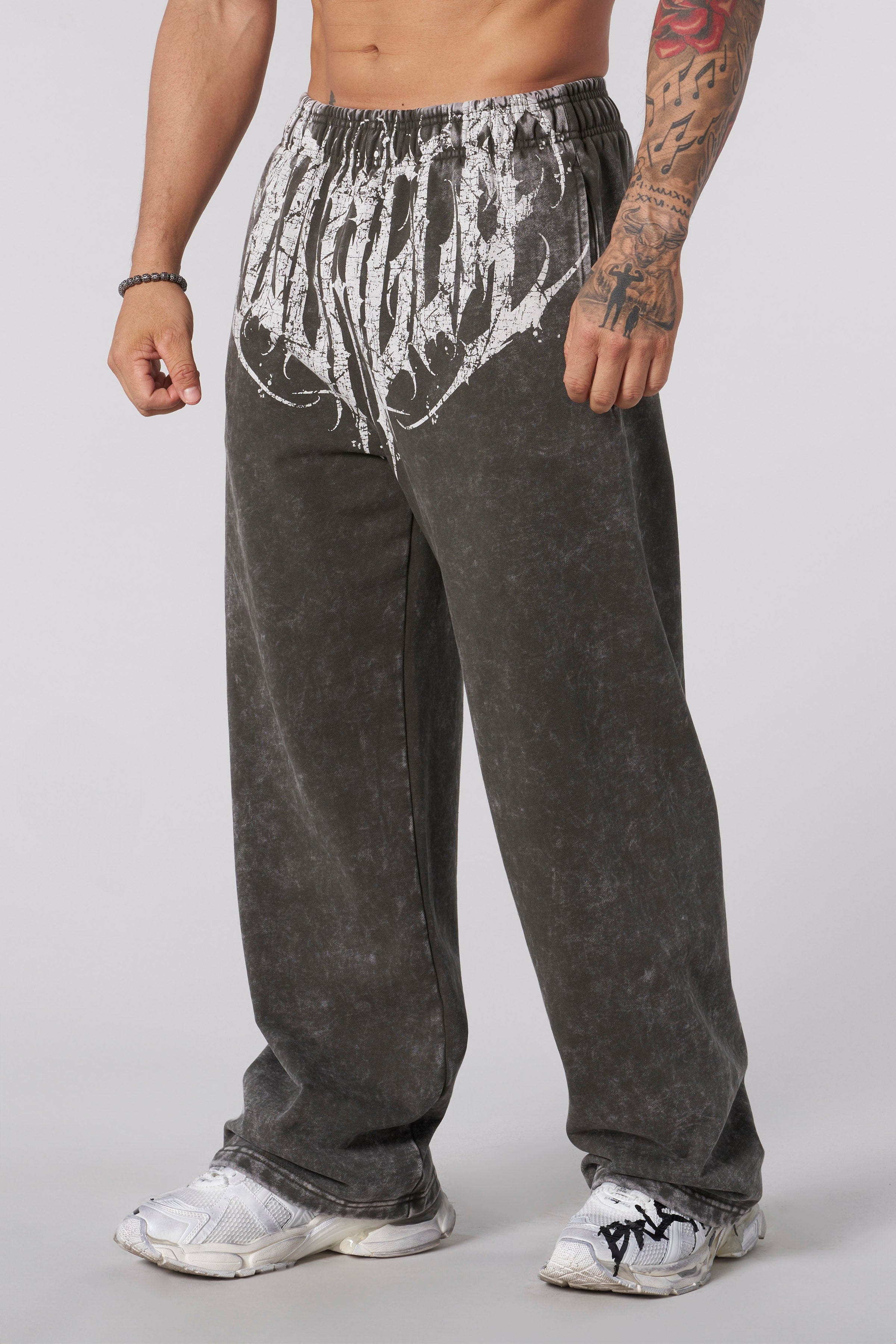 Side profile of streetwear joggers with vintage wash