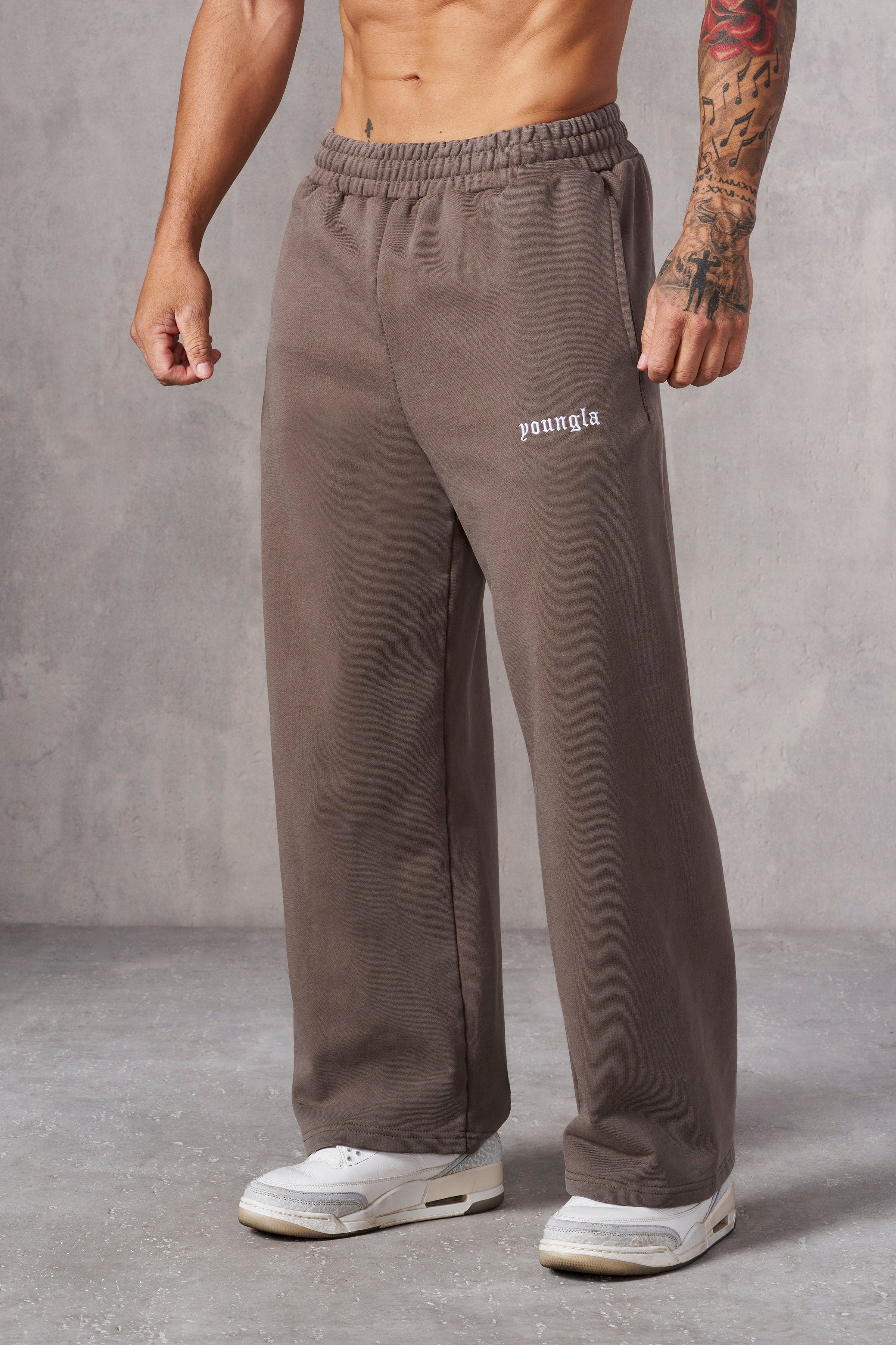 Close-up of fabric texture on relaxed fit pants for everyday comfort.