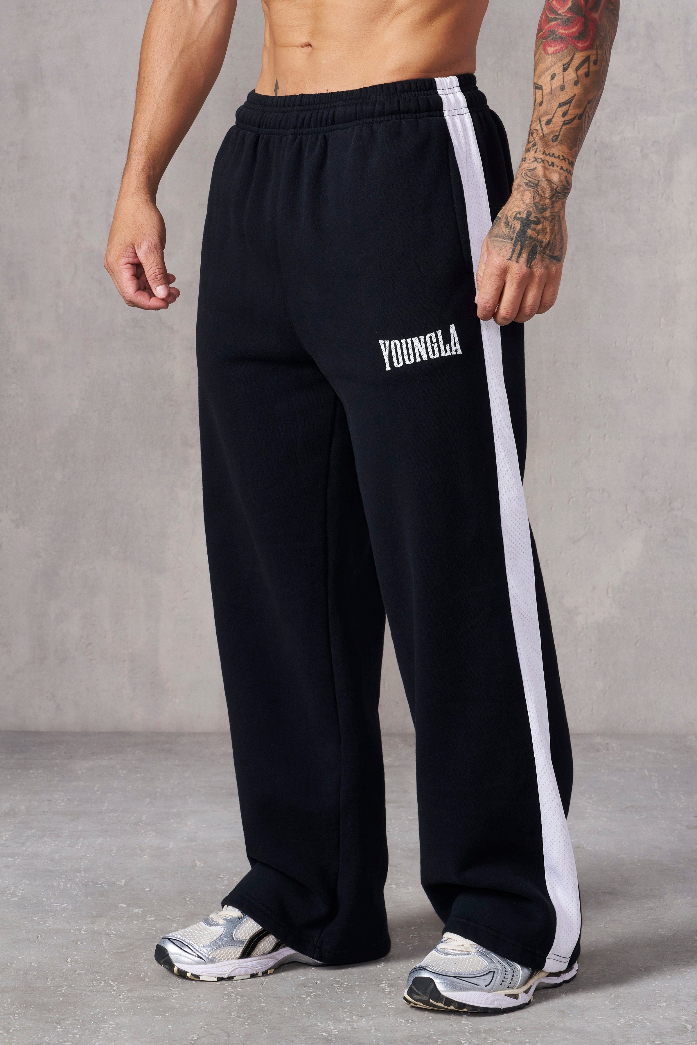 Foldable design of camo sweatpants showing interior fleece lining