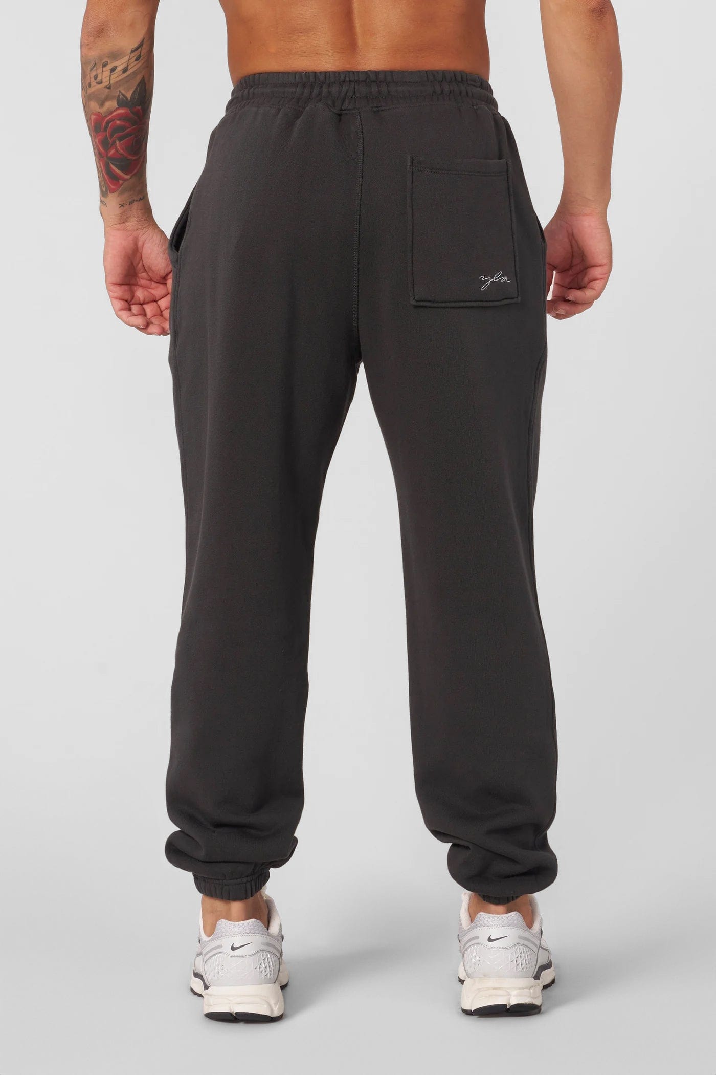 Close-up of mens cotton joggers showing cargo pocket detail