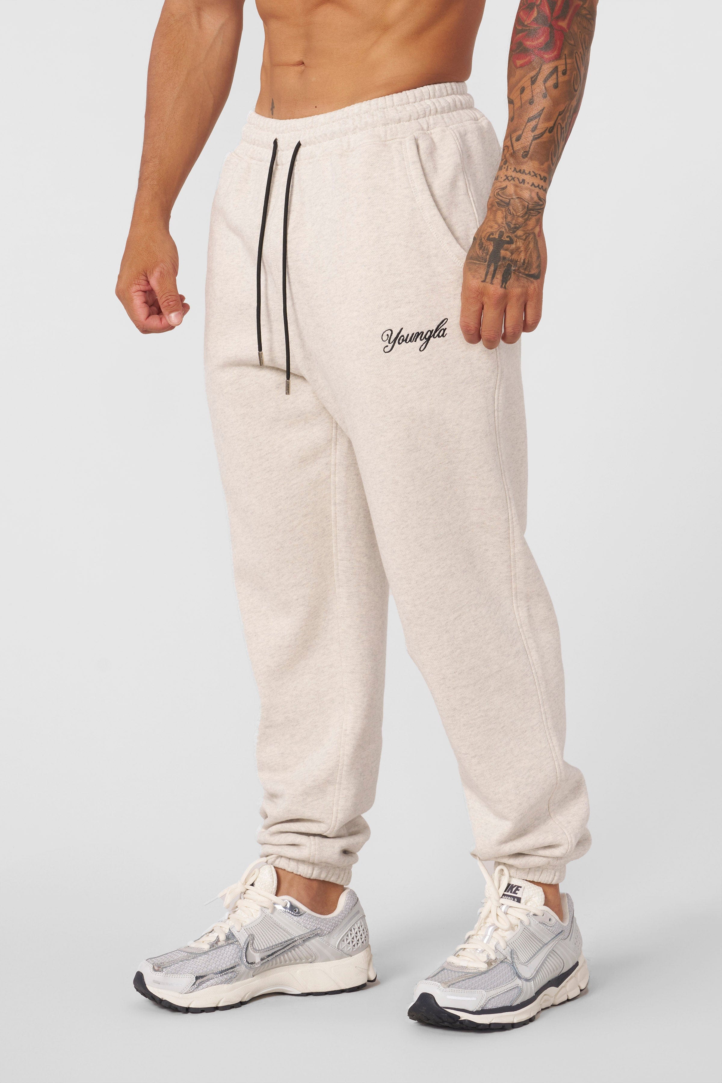 Close-up of mens cotton joggers showing cargo pocket detail