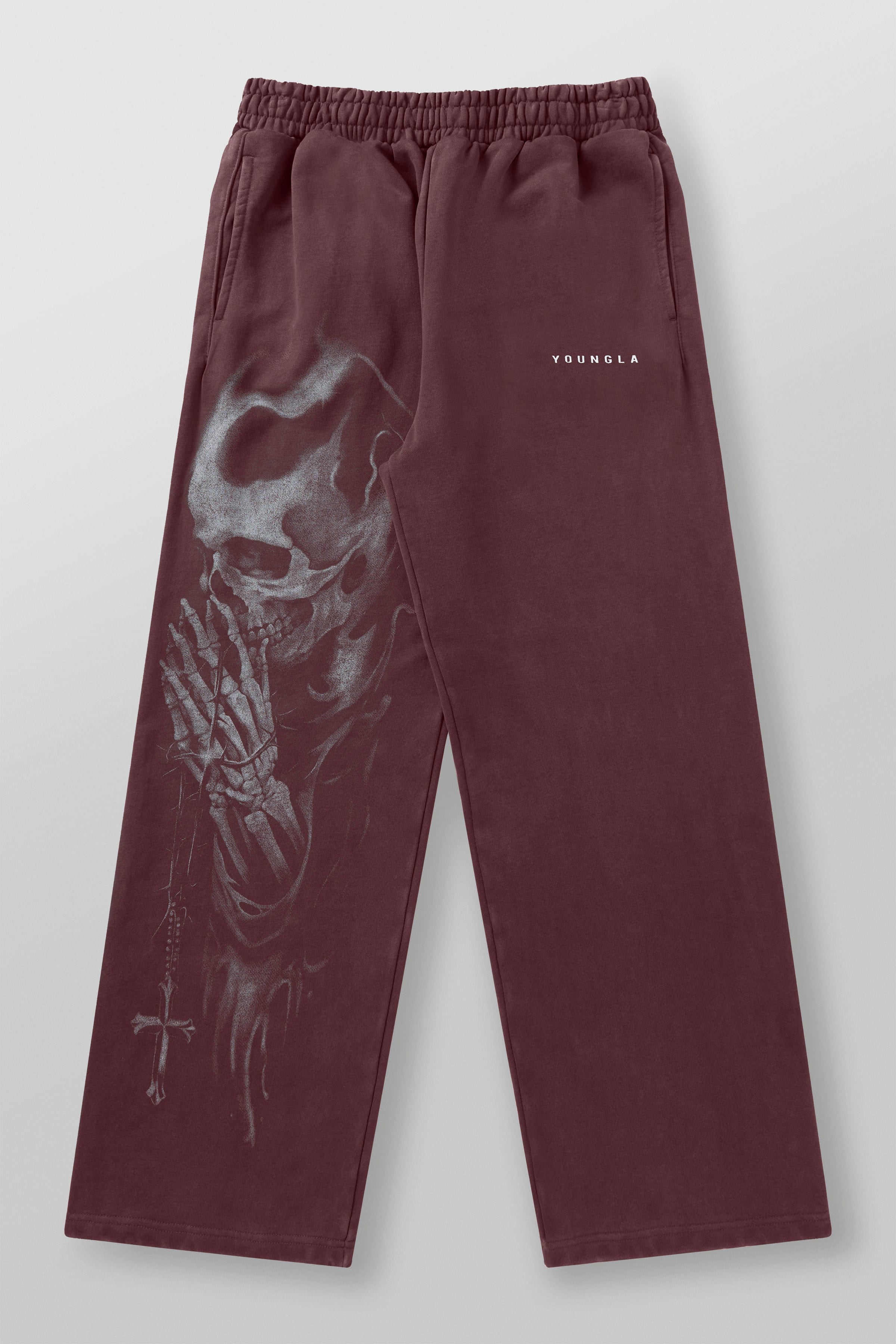 Close-up of skull graphic on black cotton sweatpants