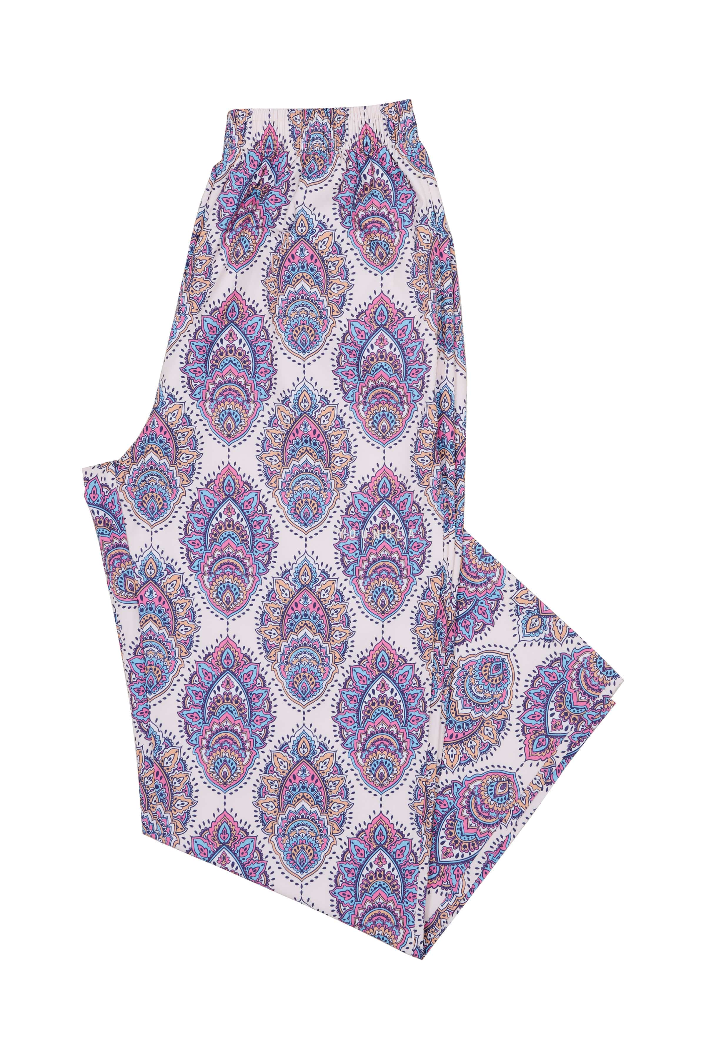Model wearing loose fitting pants with a vintage aesthetic, suitable for casual outings