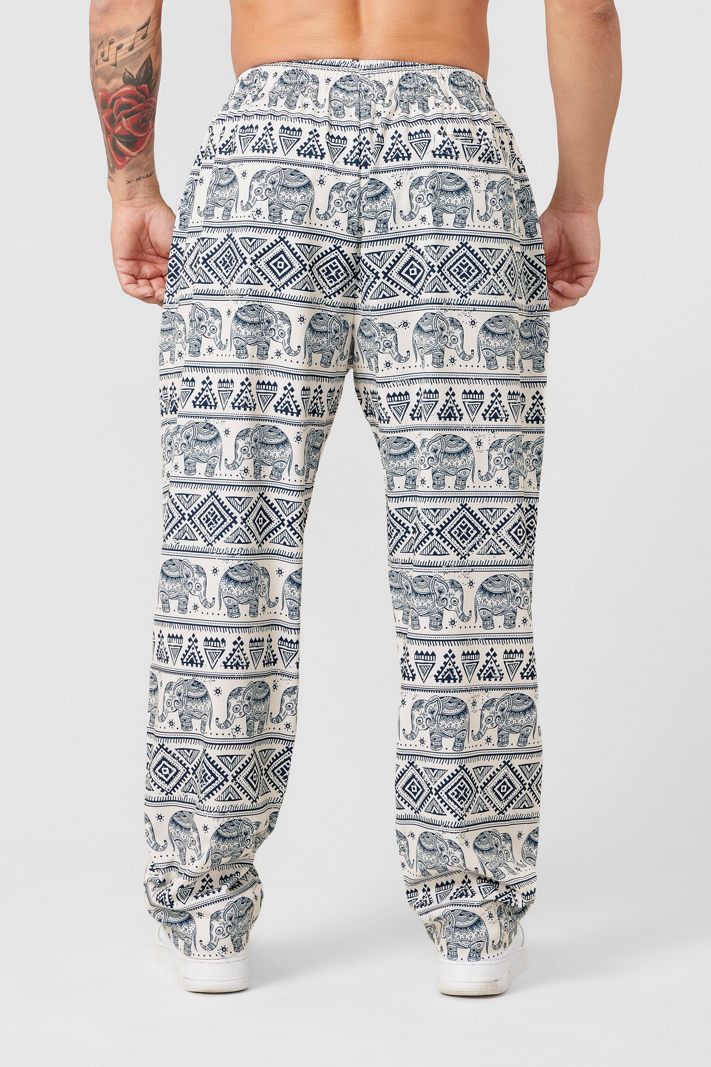 Model wearing loose fitting pants with a vintage aesthetic, suitable for casual outings