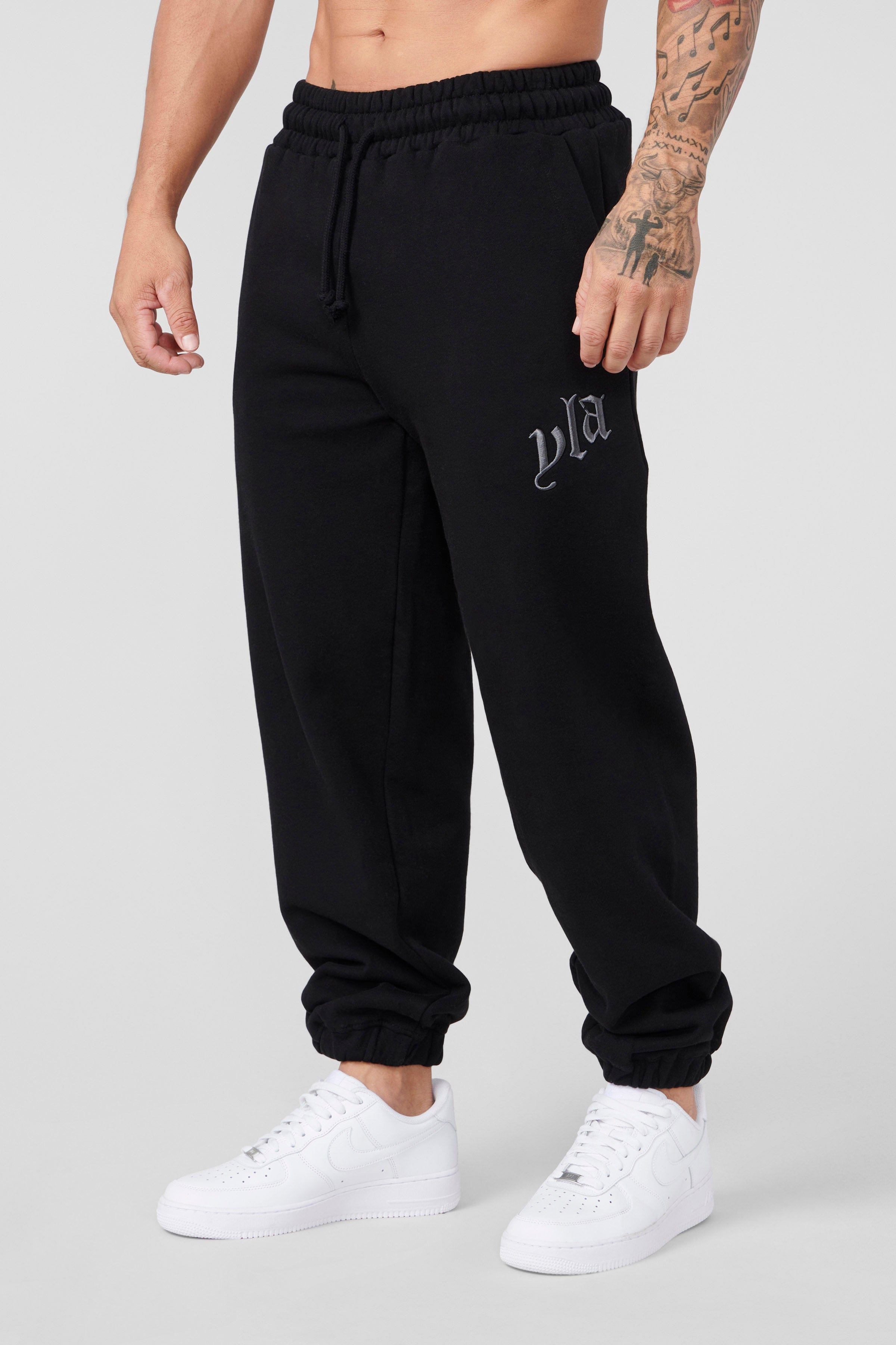 Side view showcasing the loose fit of the joggers during a workout.