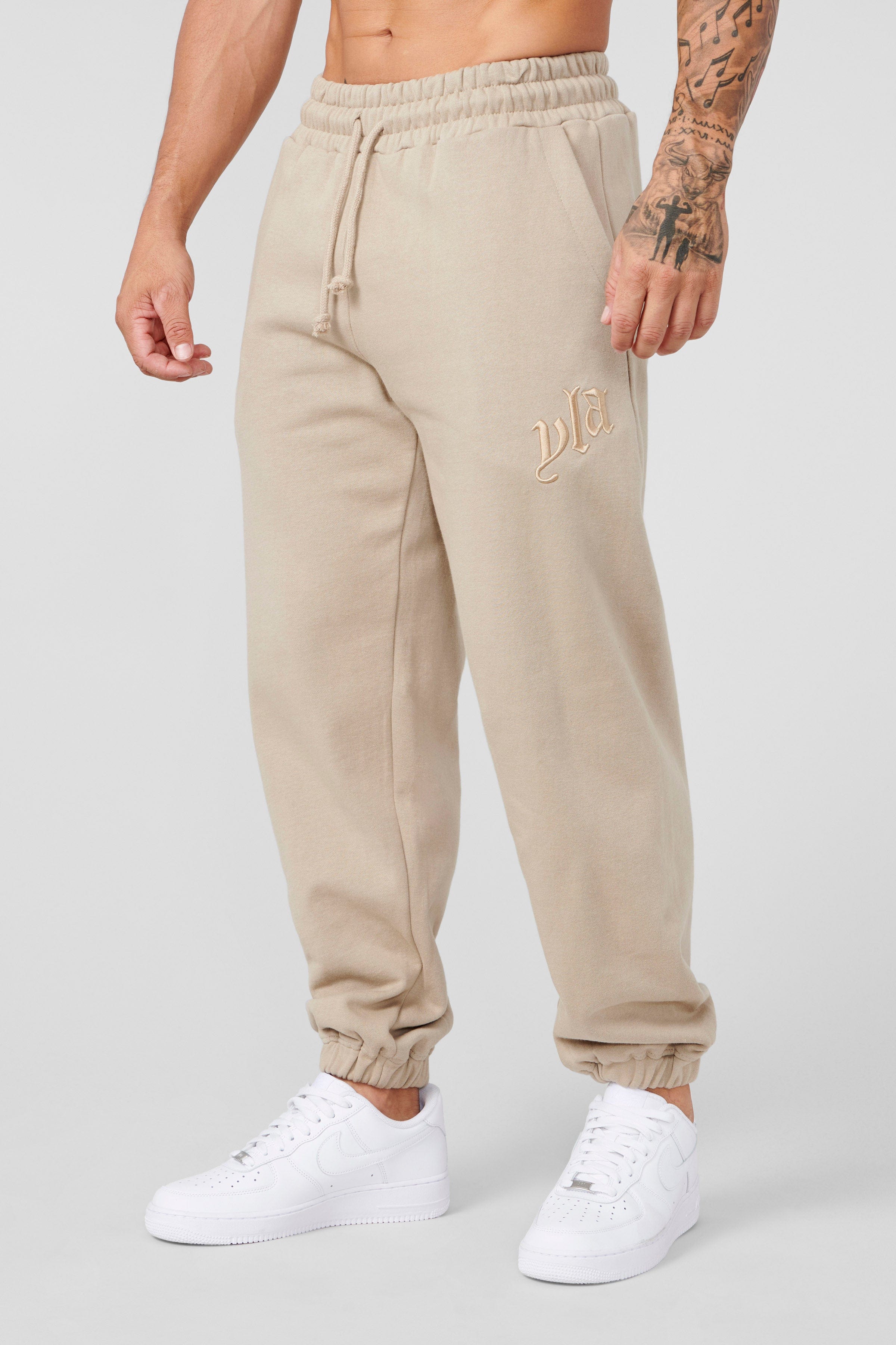 Side view showcasing the loose fit of the joggers during a workout.
