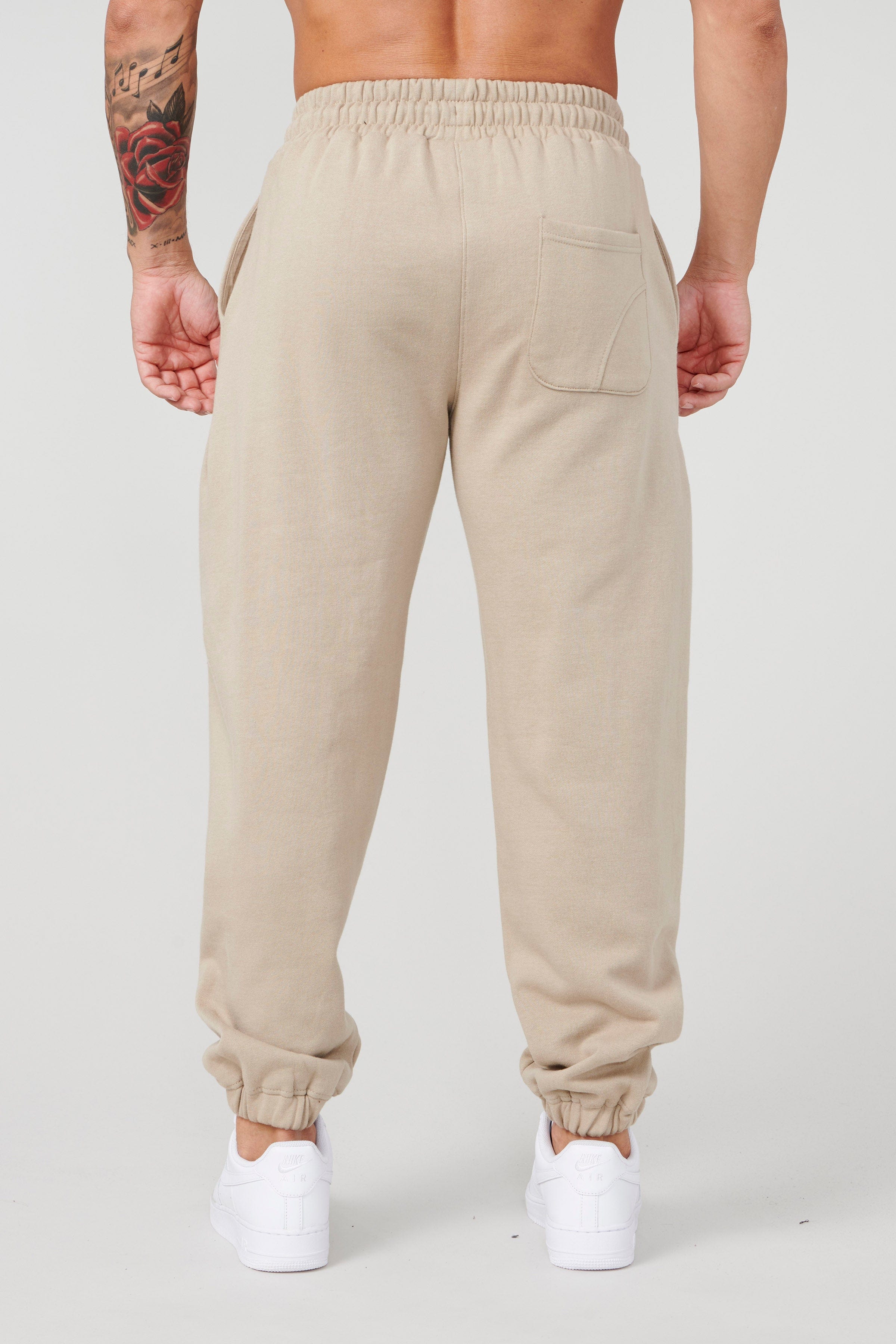 Front view of CloudSoft fleece joggers in a casual setting.