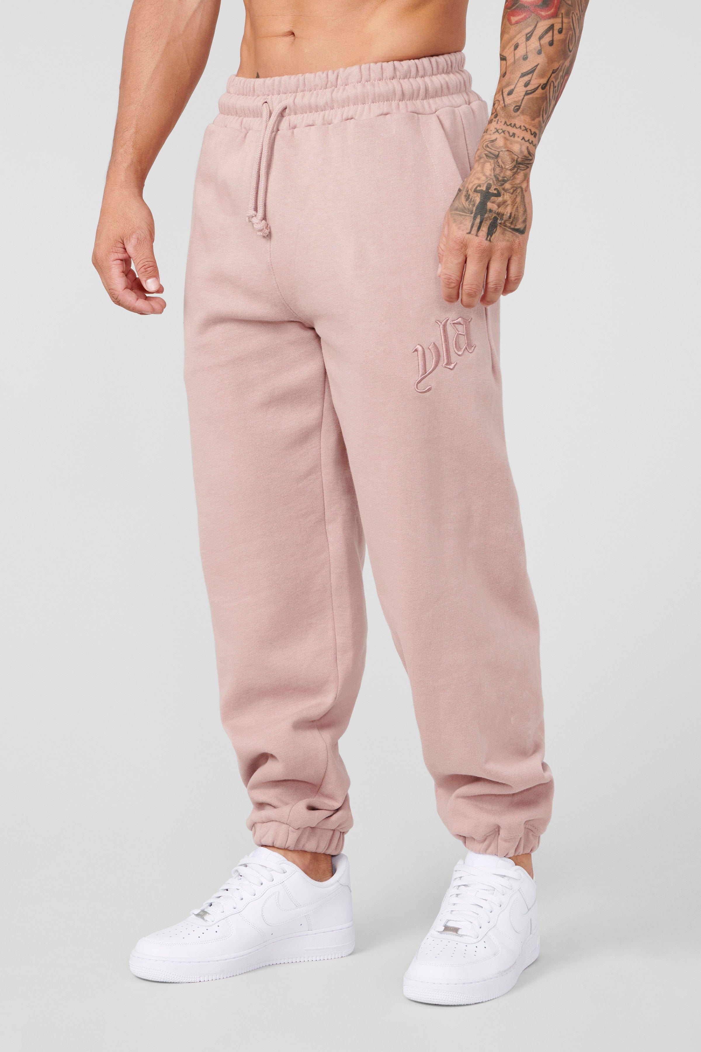 Front view of CloudSoft fleece joggers in a casual setting.