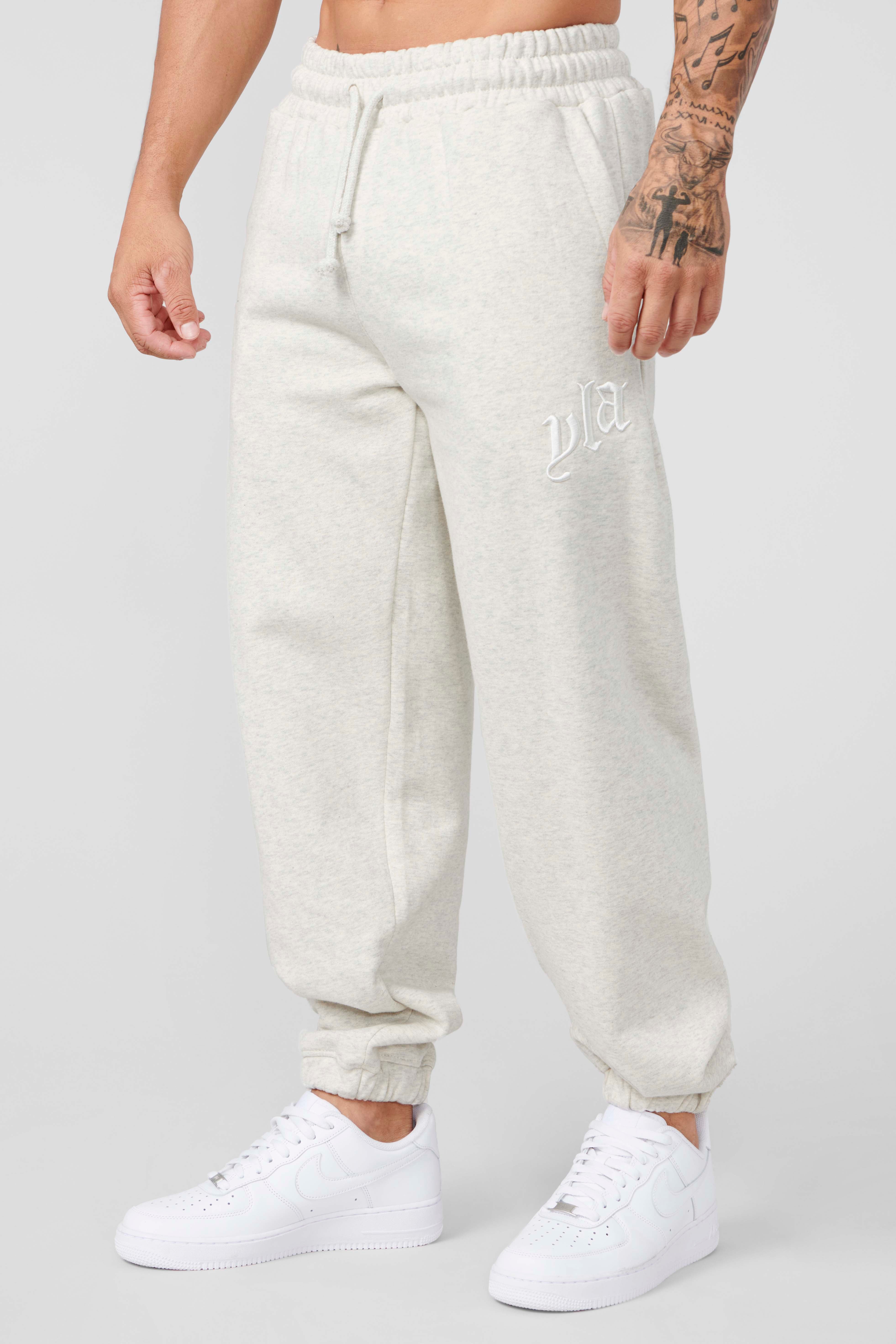 Front view of CloudSoft fleece joggers in a casual setting.
