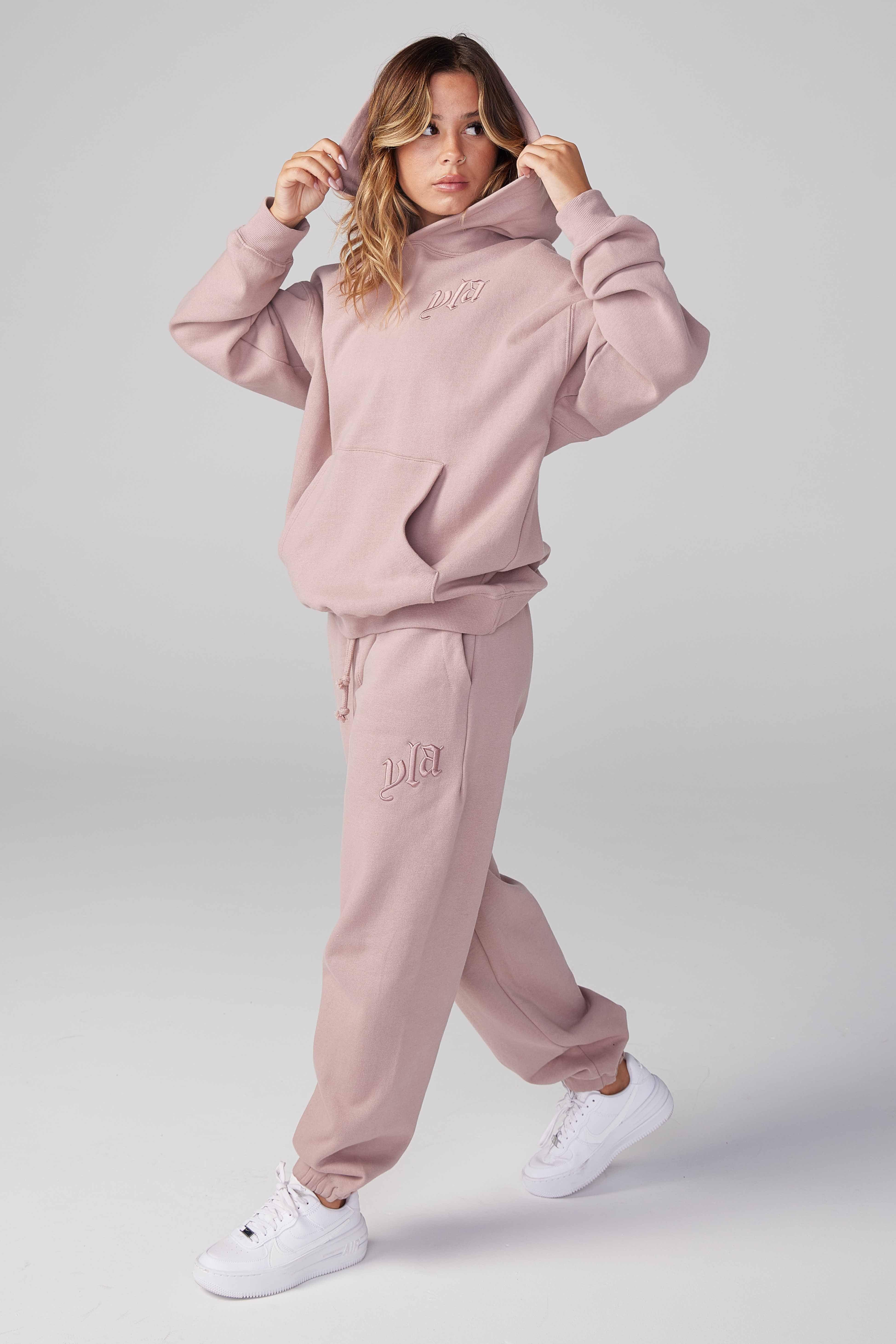 Front view of CloudSoft fleece joggers in a casual setting.