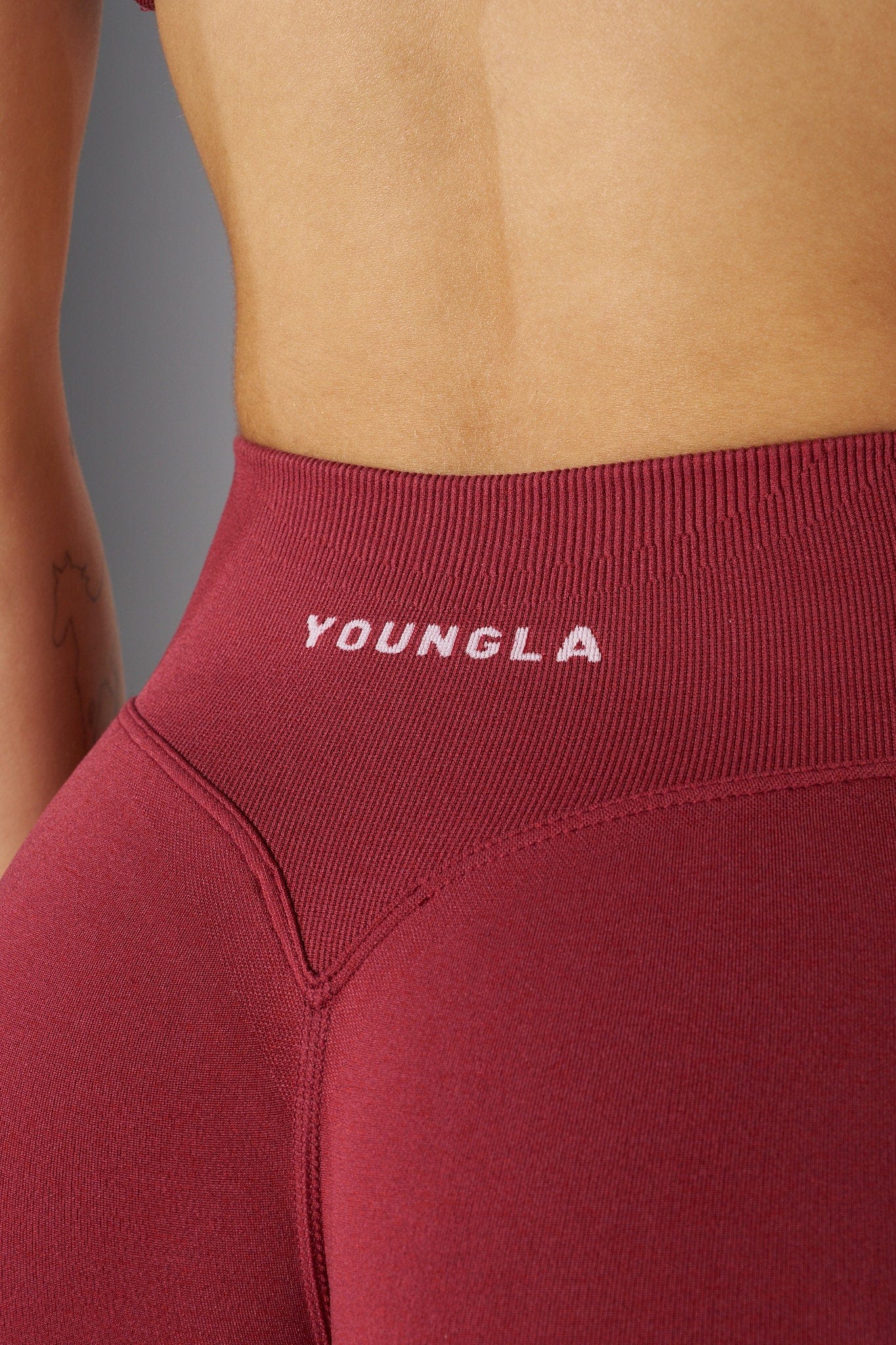 Close-up of the ribbed waistband of the seamless shorts.