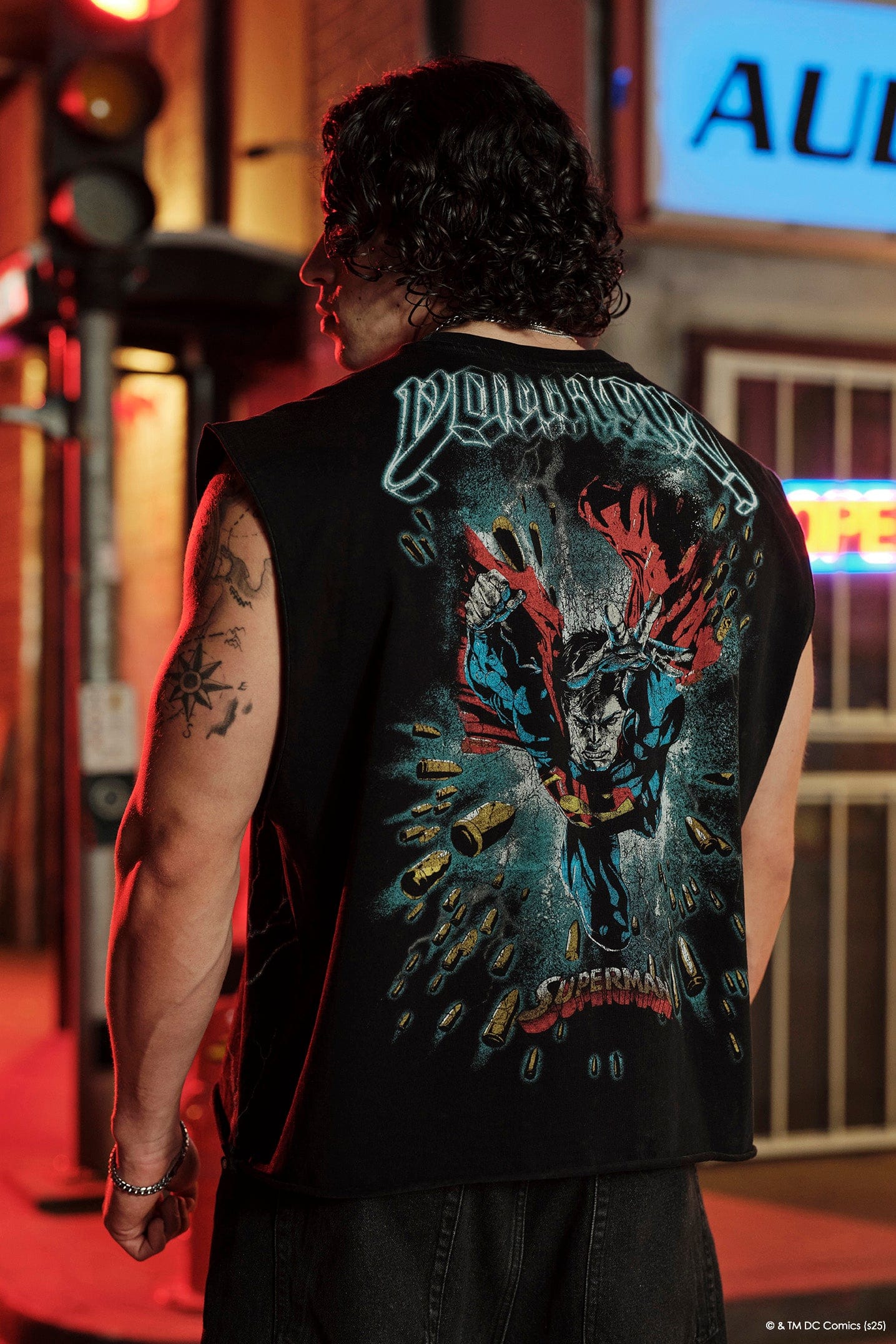 Back design of Superman cut-off shirt, featuring vibrant graphics.