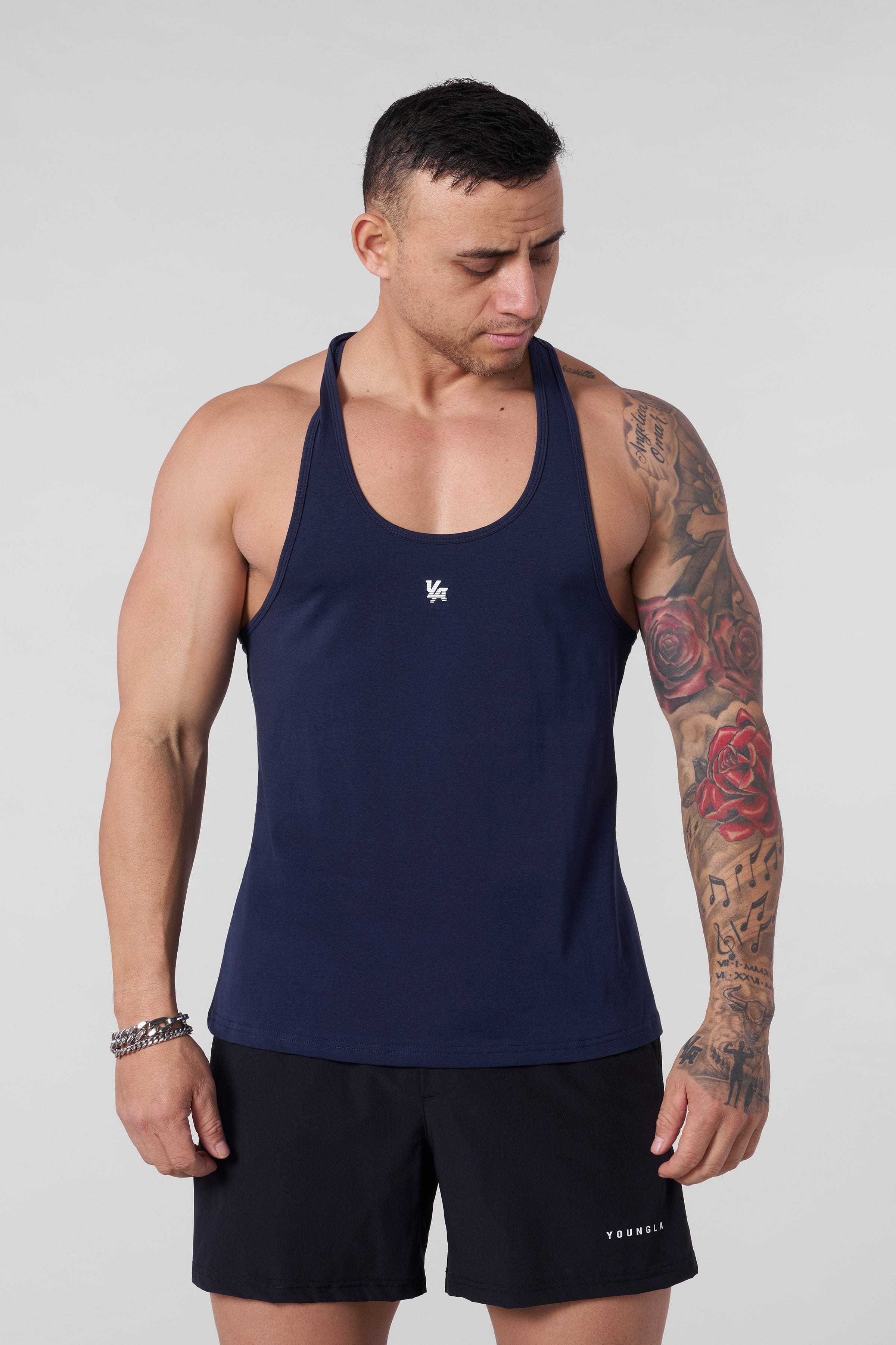 Men's workout tank top in action during a gym session