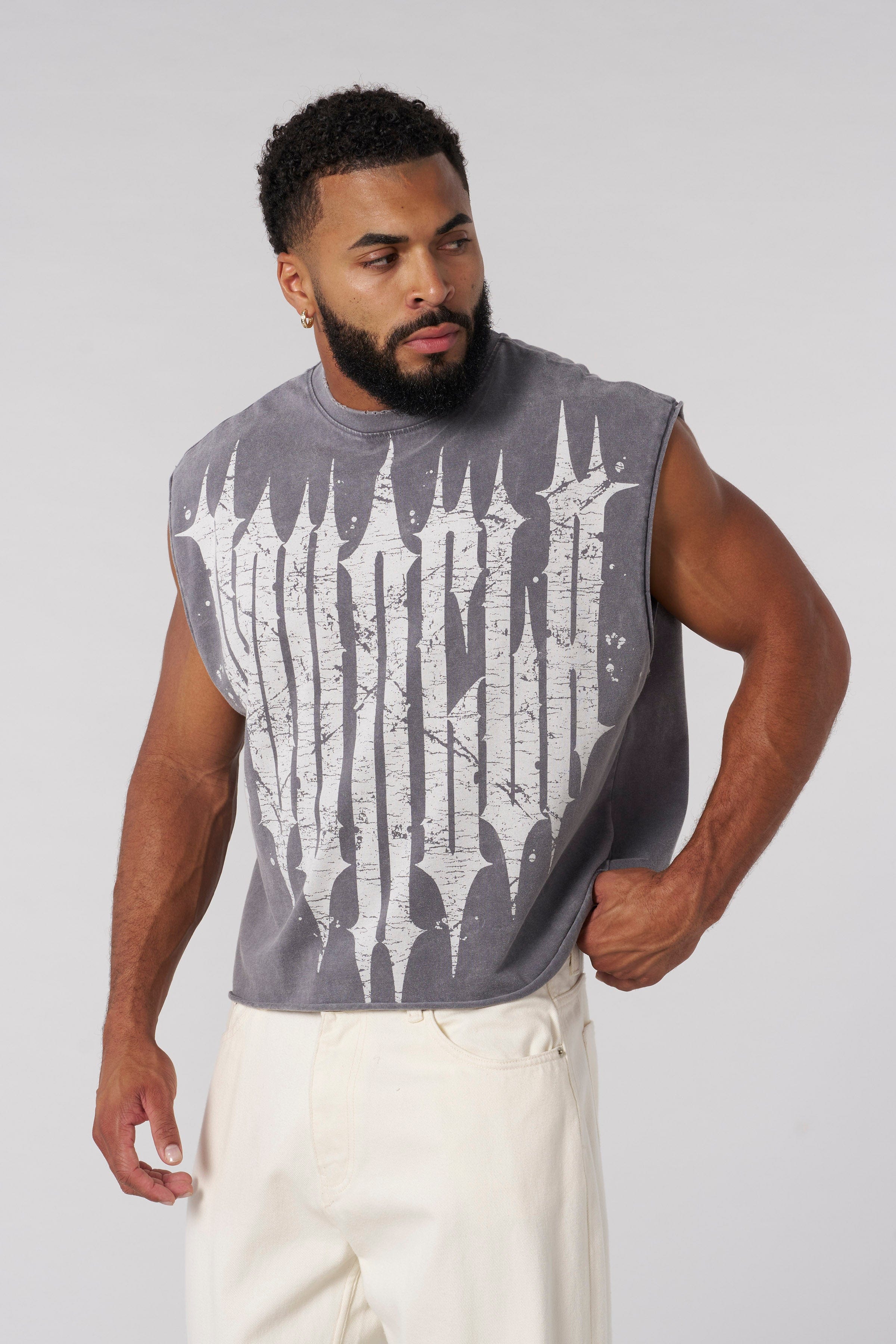 Close-up shot of the fabric and cut-off edges of the tank top.