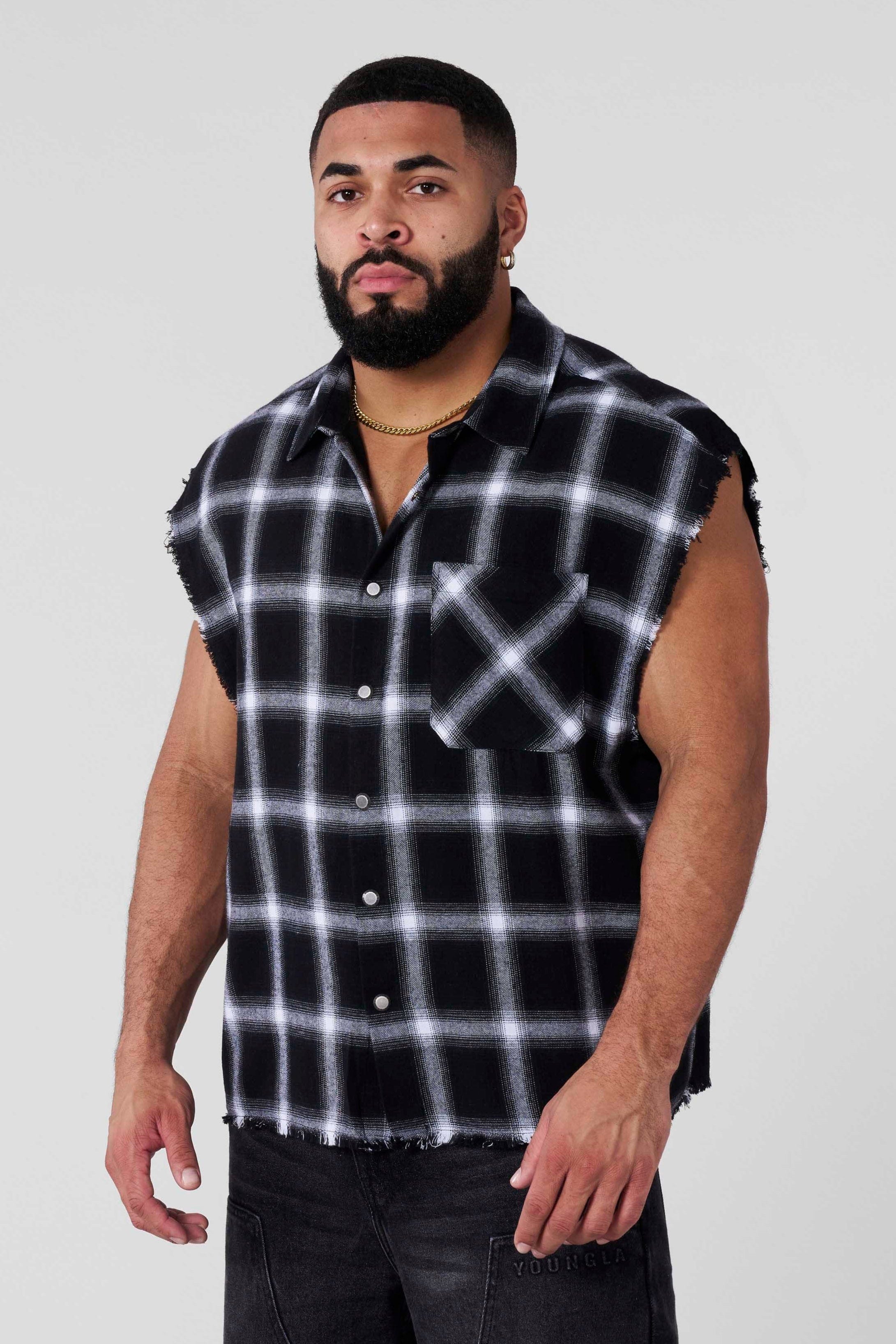 Lifestyle shot of the flannel shirt jacket worn outdoors