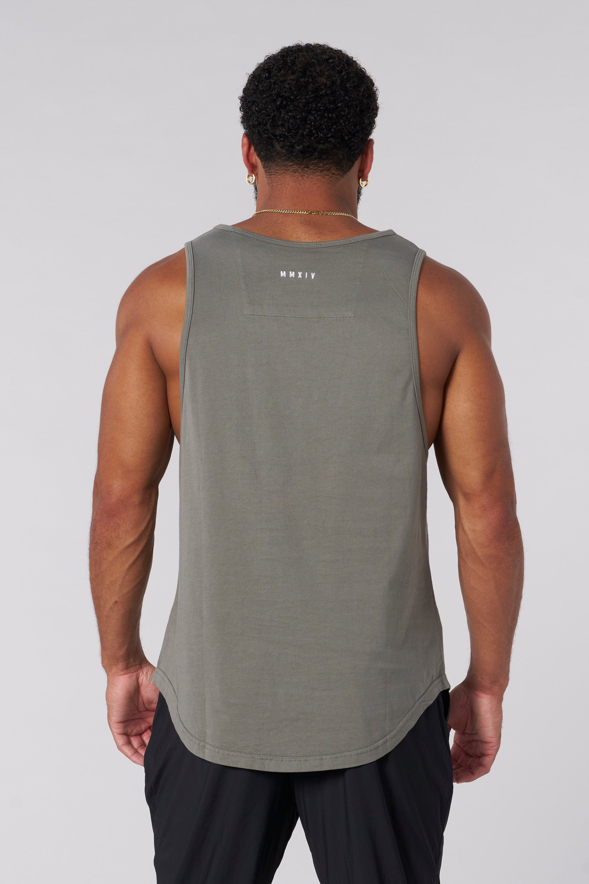 Earthy elegance cotton tank top displayed on a hanger.
