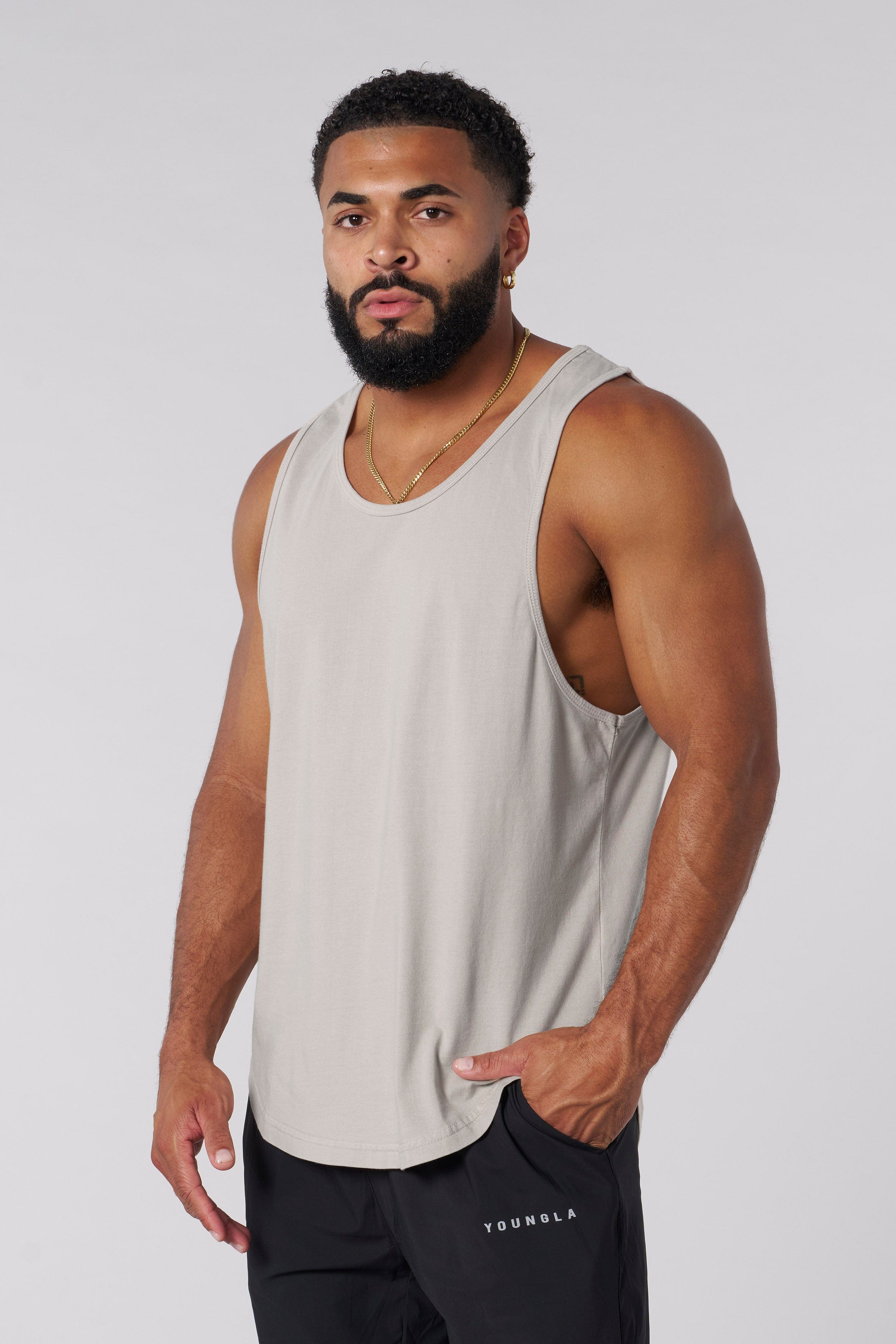 Earthy elegance cotton tank top displayed on a hanger.