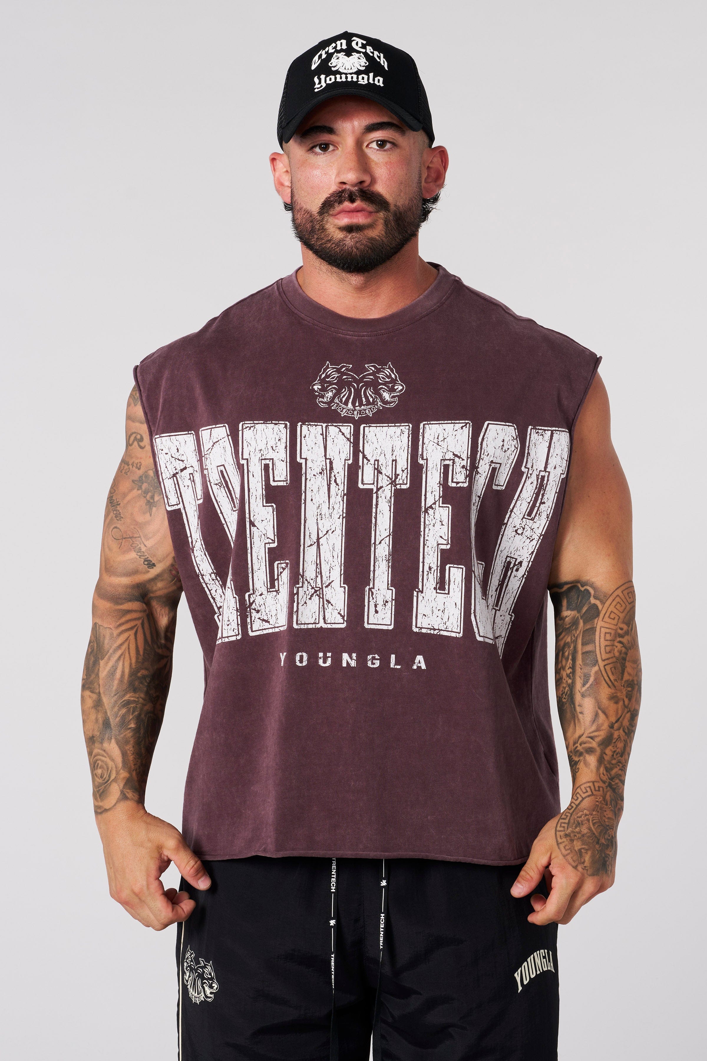 Model wearing the Tren Twins tank top during a workout session.
