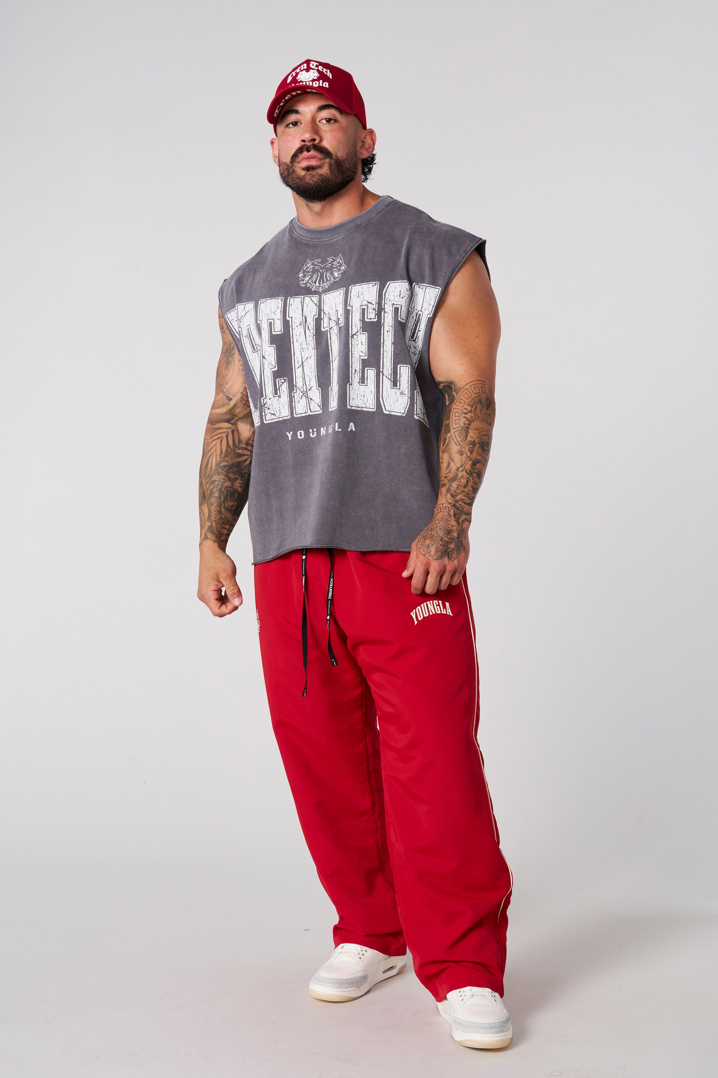 Model wearing the Tren Twins tank top during a workout session.