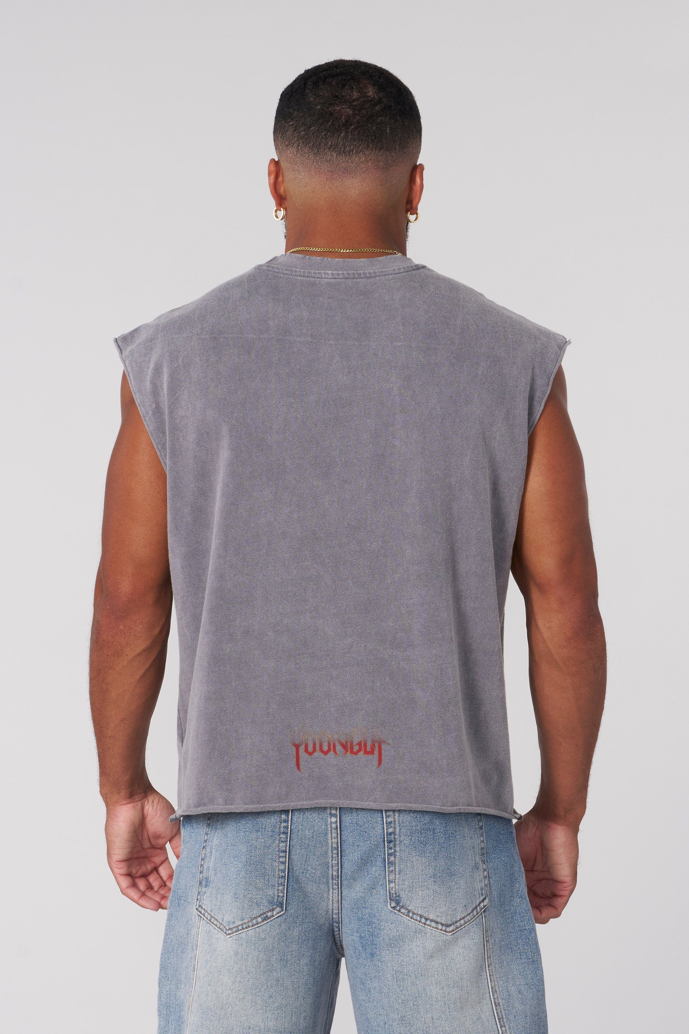 Close-up of the vintage-washed fabric of the graphic tank top.