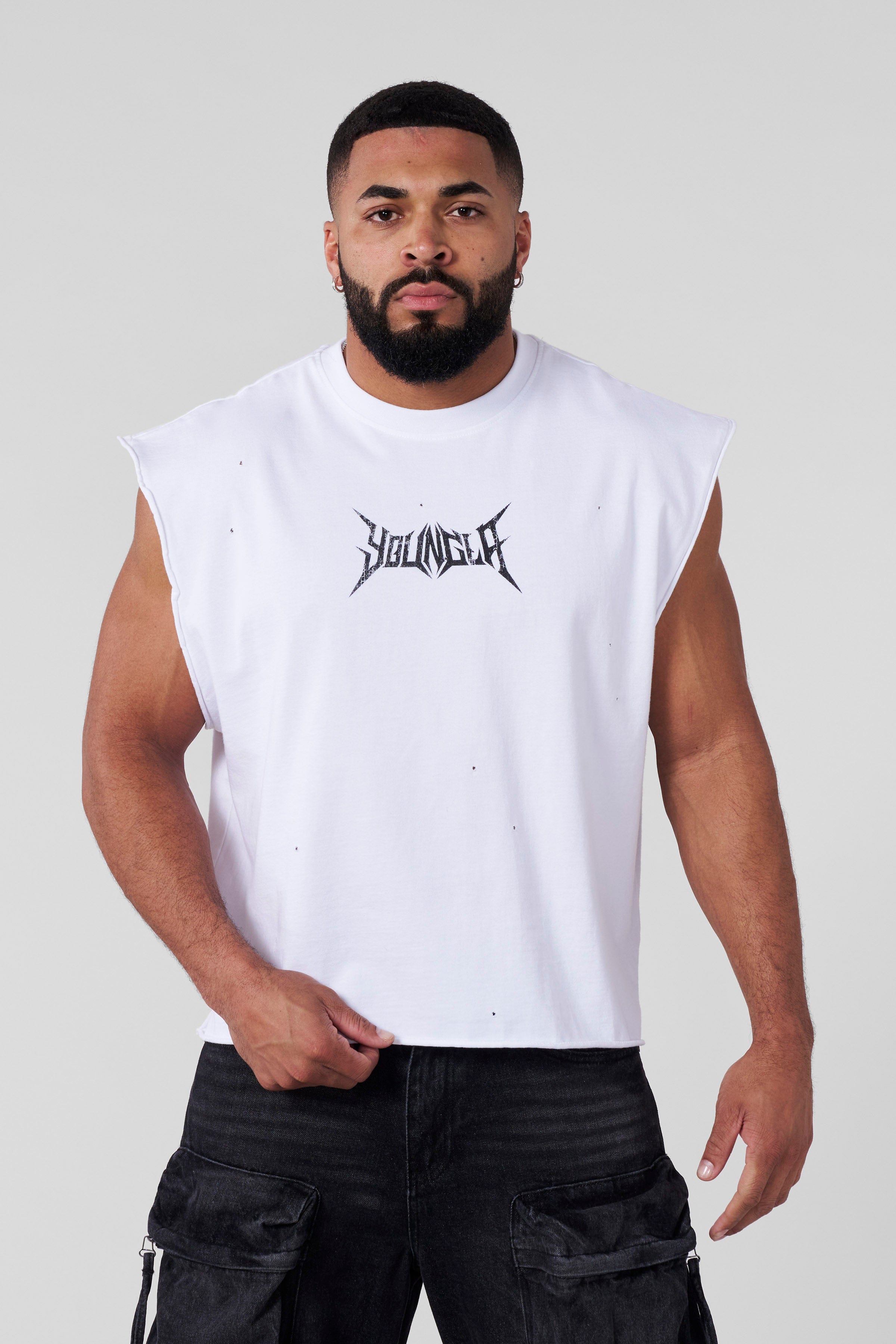 Side view of model wearing workout tank top during training