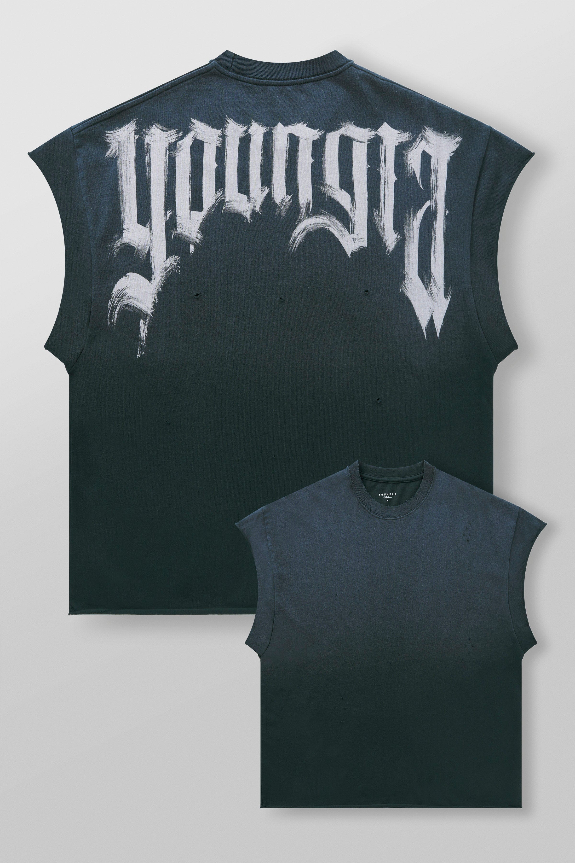 Closeup of shoulder drop shirt neckline and upper fade wash texture