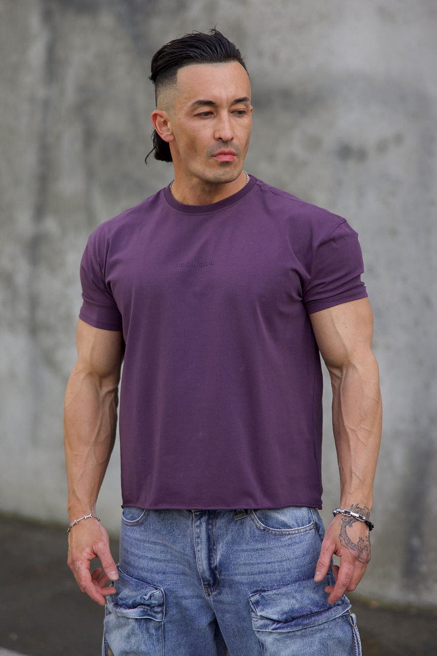 Close-up of the tailored details on the boxy crop tee, highlighting the fabric.