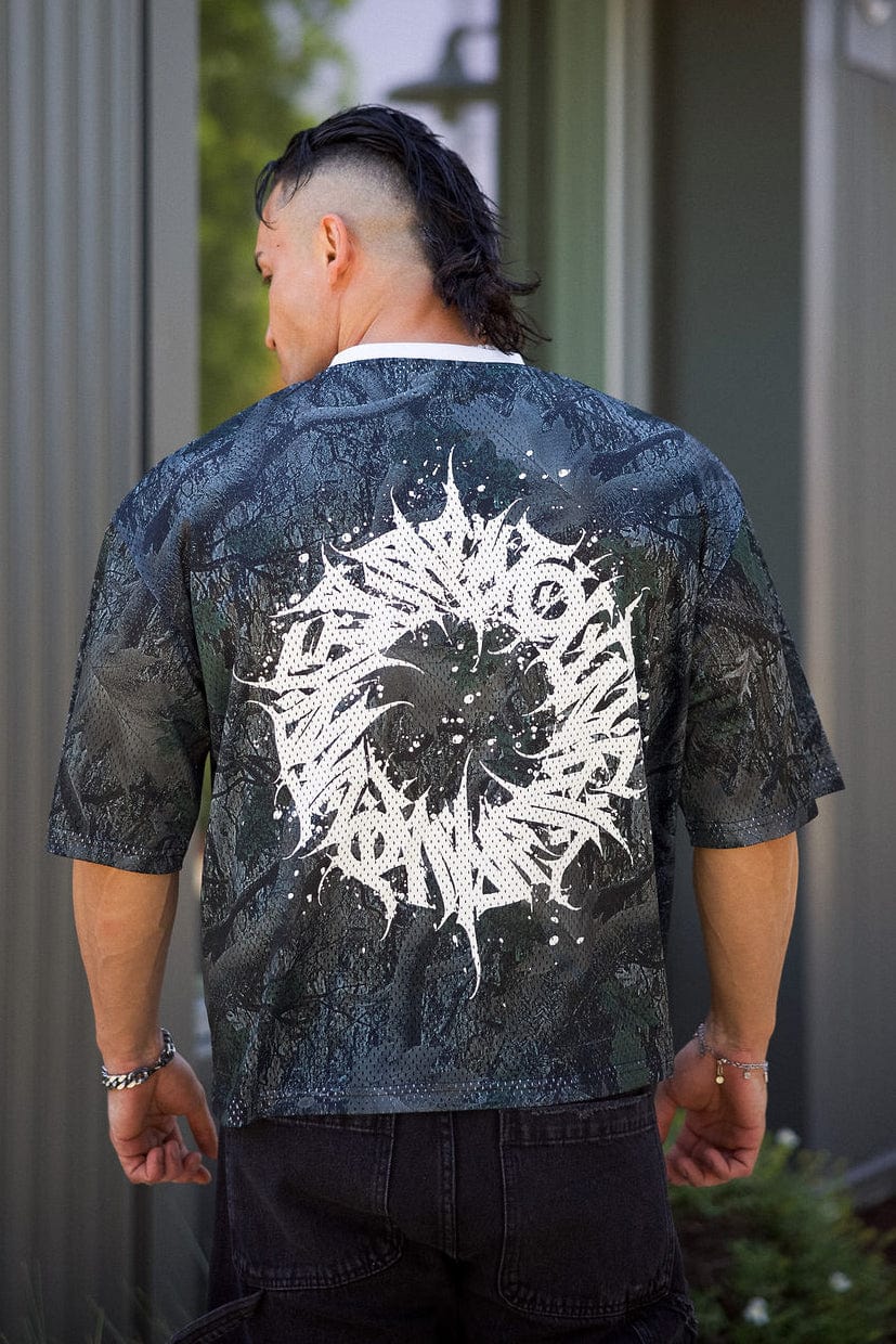 Close-up of relaxed fit bike jersey showing mesh texture.