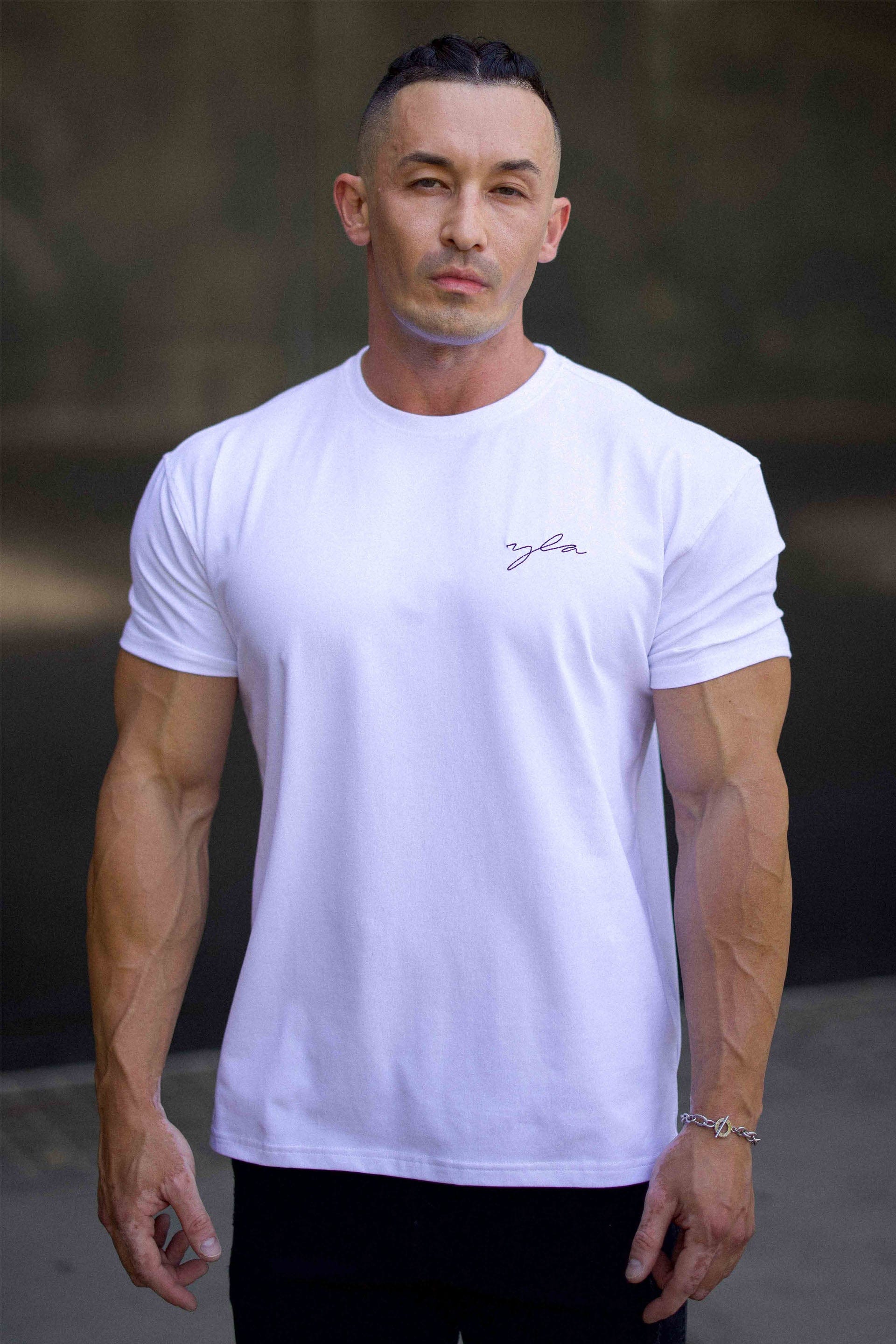 Close-up of tailored tee sleeve fit highlighting biceps contour