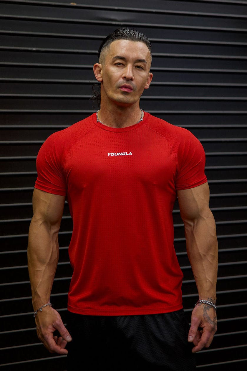 Model wearing fitness trainer t shirt outdoors on a sunny Los Angeles afternoon