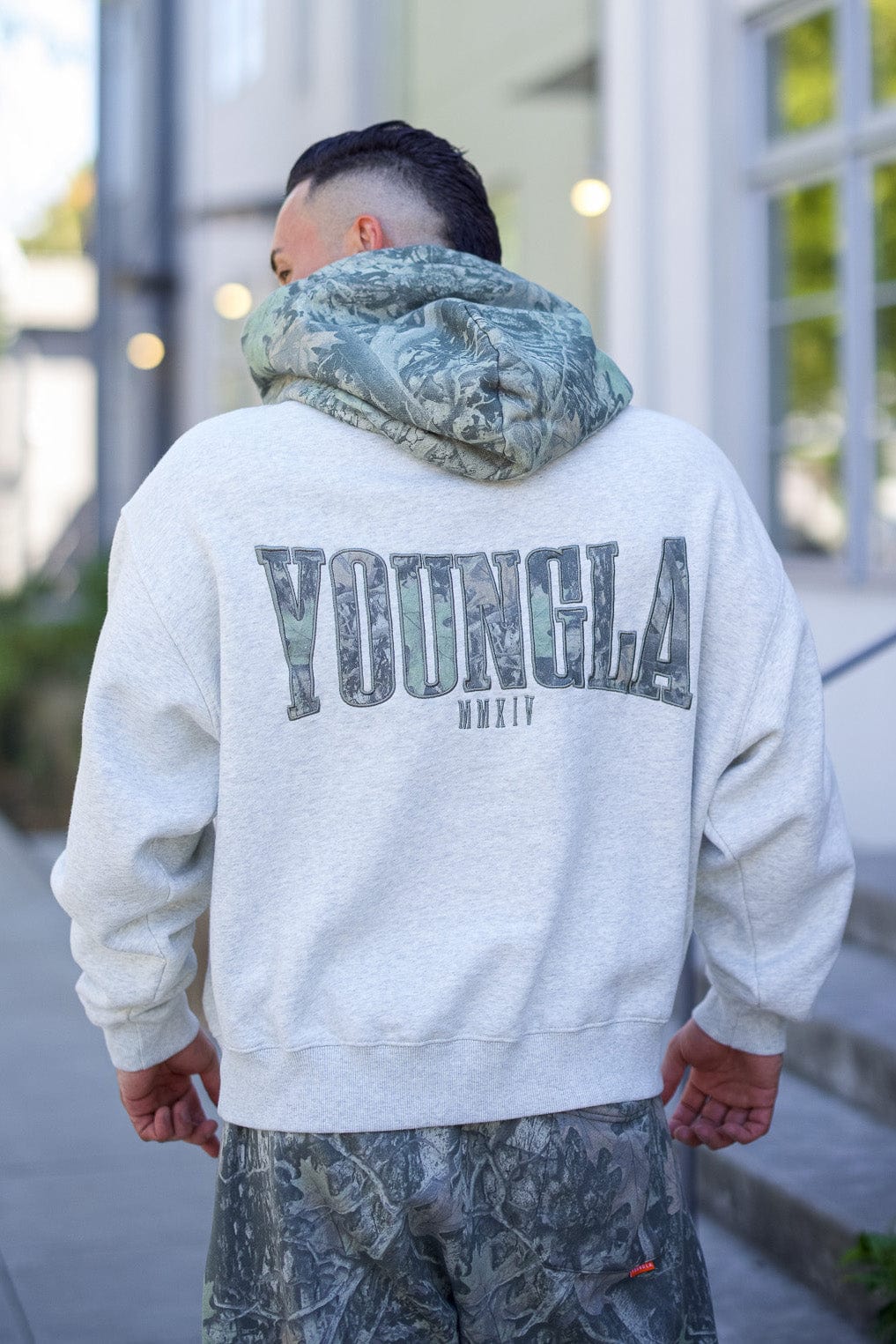 Side view of the tree camo hoodie, highlighting the unique camo pattern.