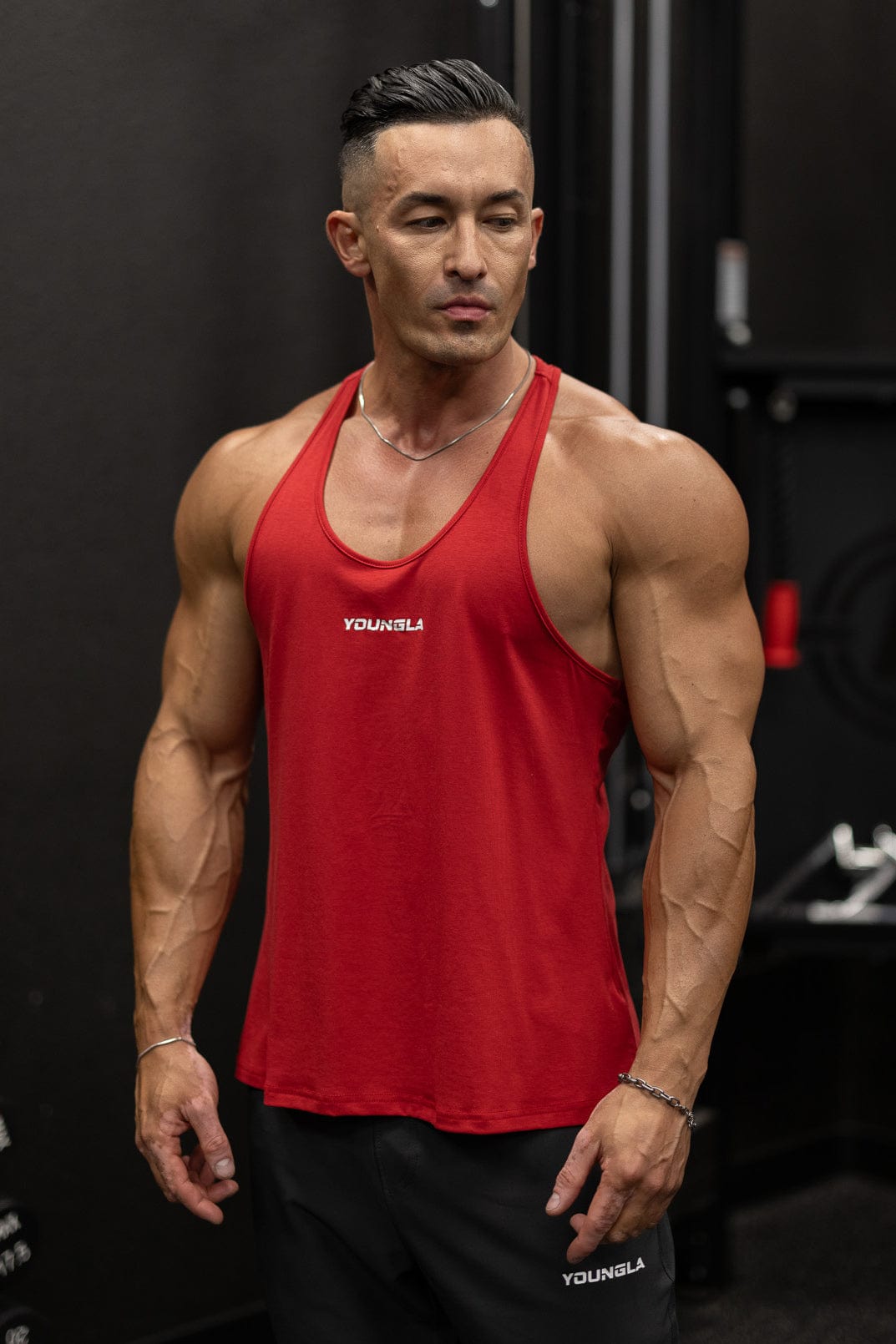 Front view of the Ultimate Muscle Stringer Tank Top in action.