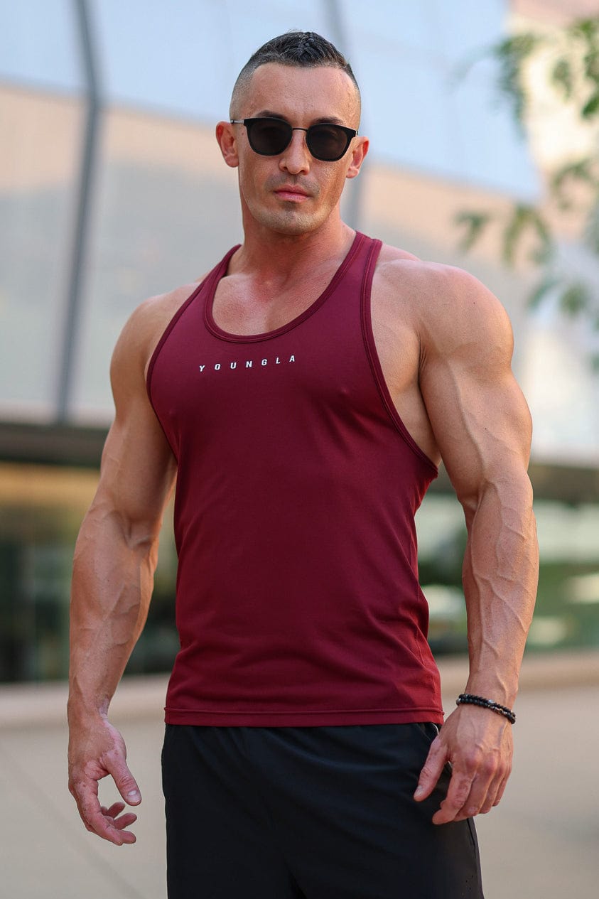 Side view showing fabric stretch and fit of performance tank