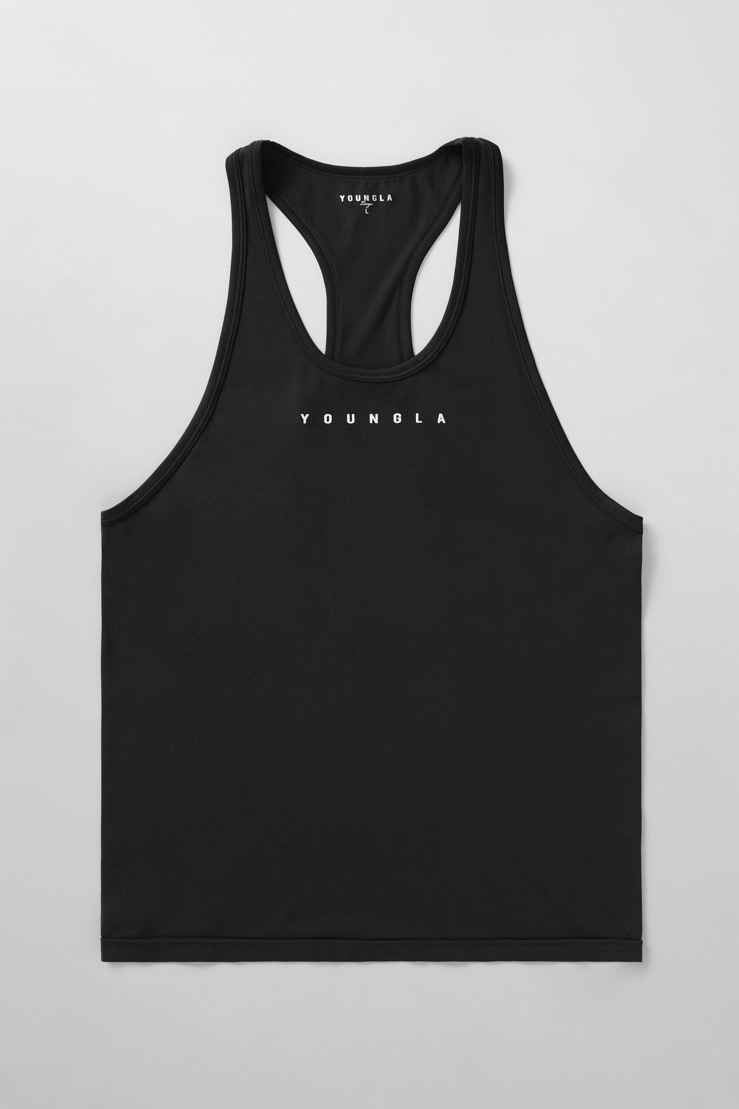 Close-up of 336 Flex Fit muscle tank top on male model during workout