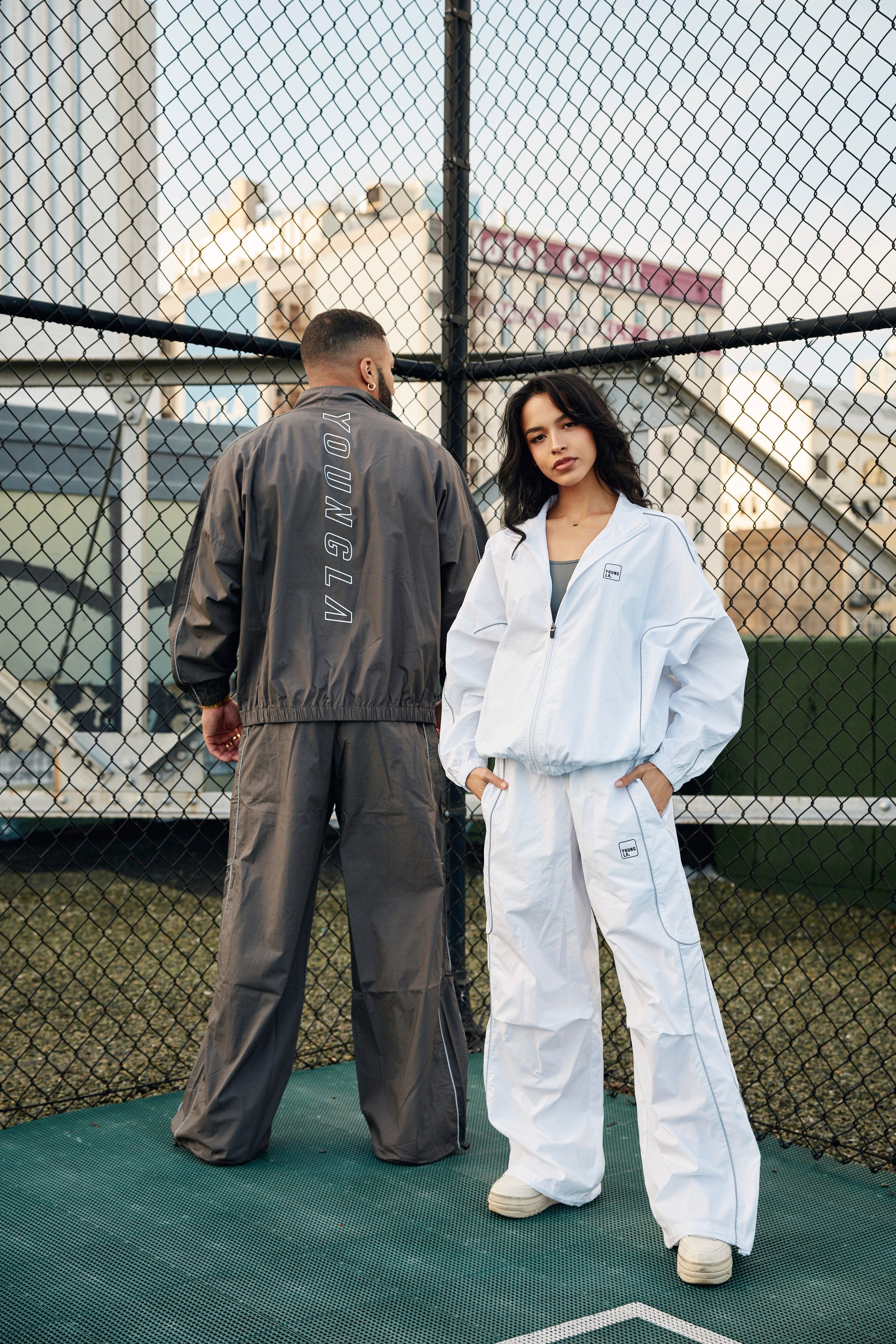 Front view of baggy track pants with adjustable hem for a relaxed fit