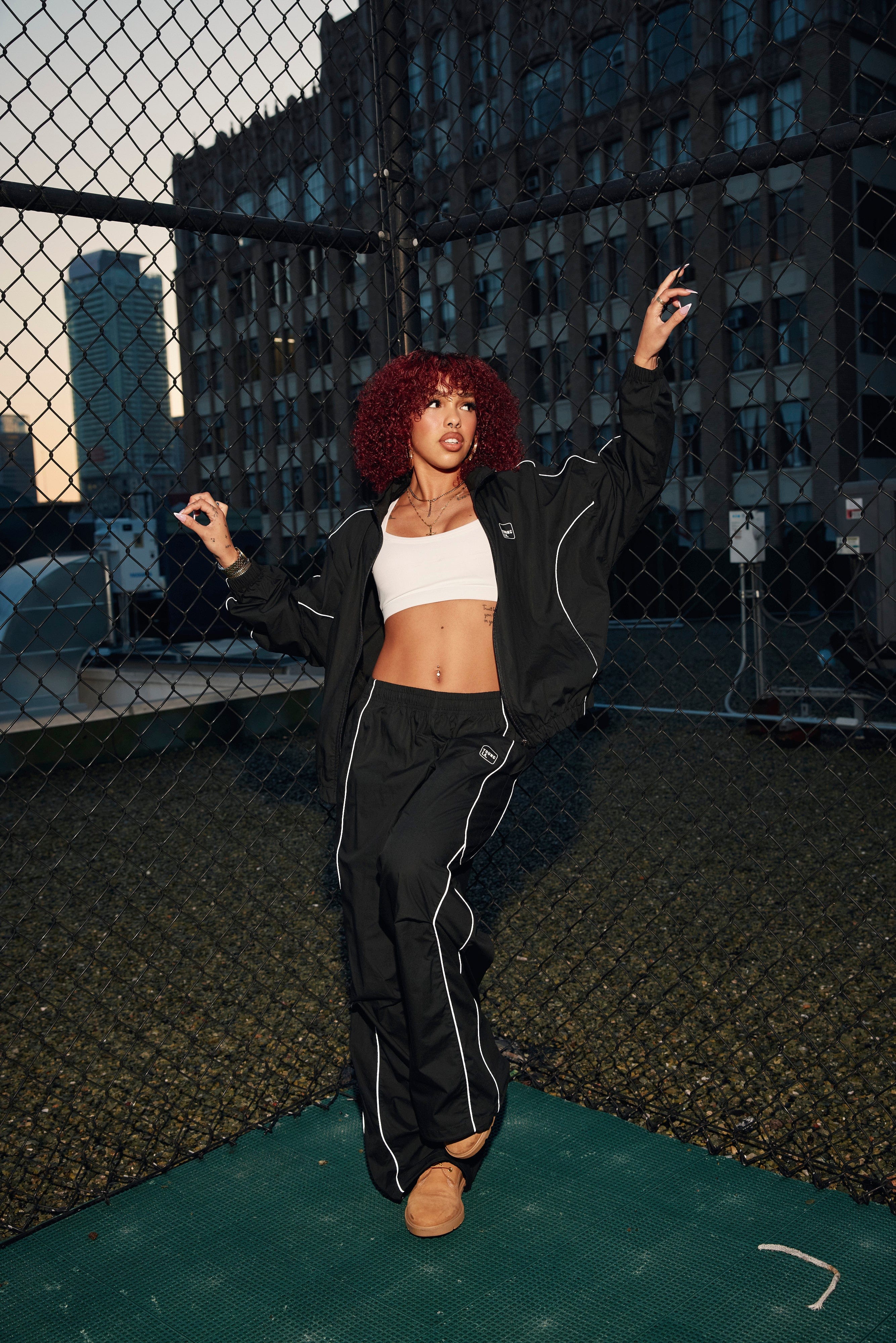 Side view of cotton track pants for women with reflective details for evening walks