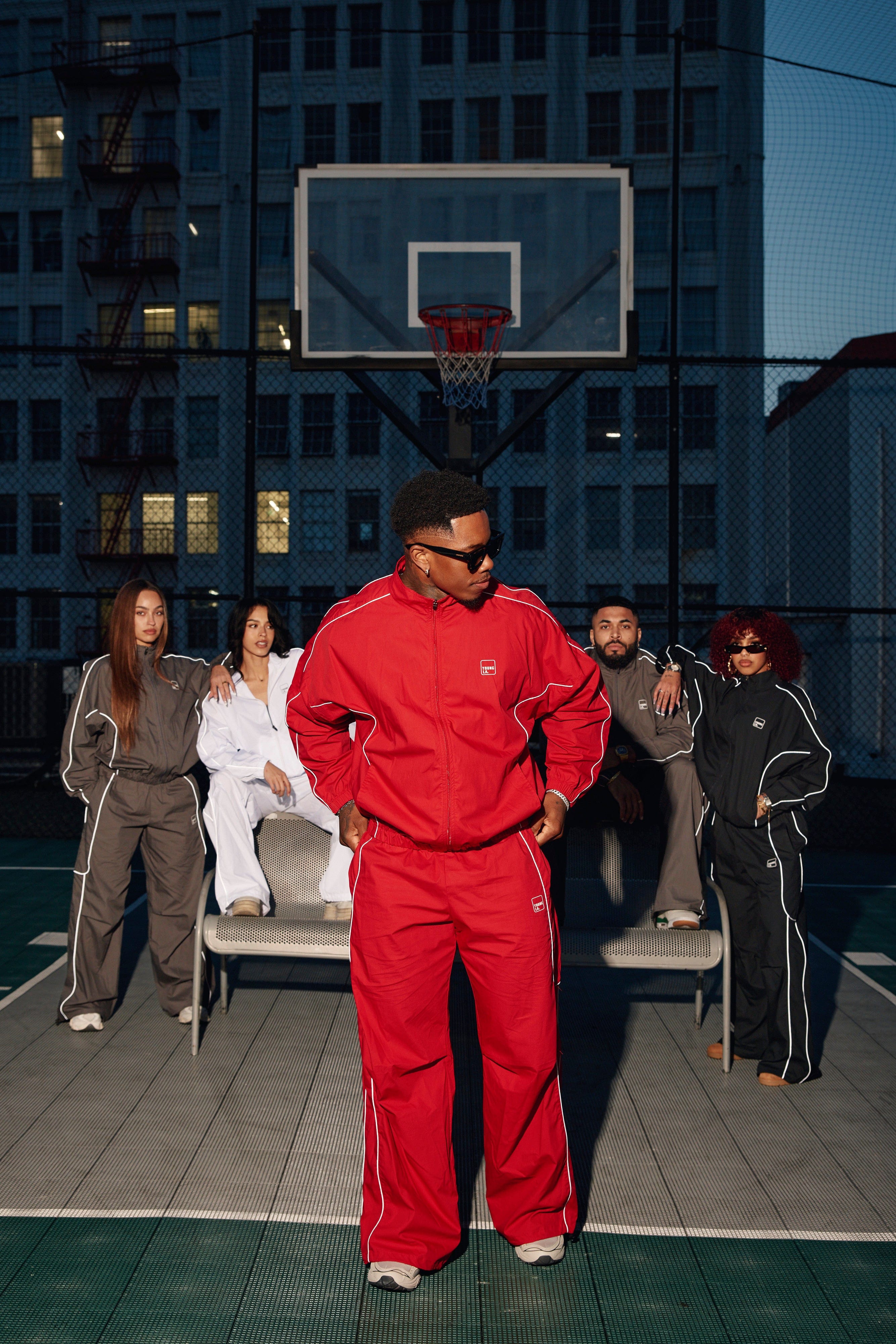 Front view of baggy track pants with adjustable hem for a relaxed fit