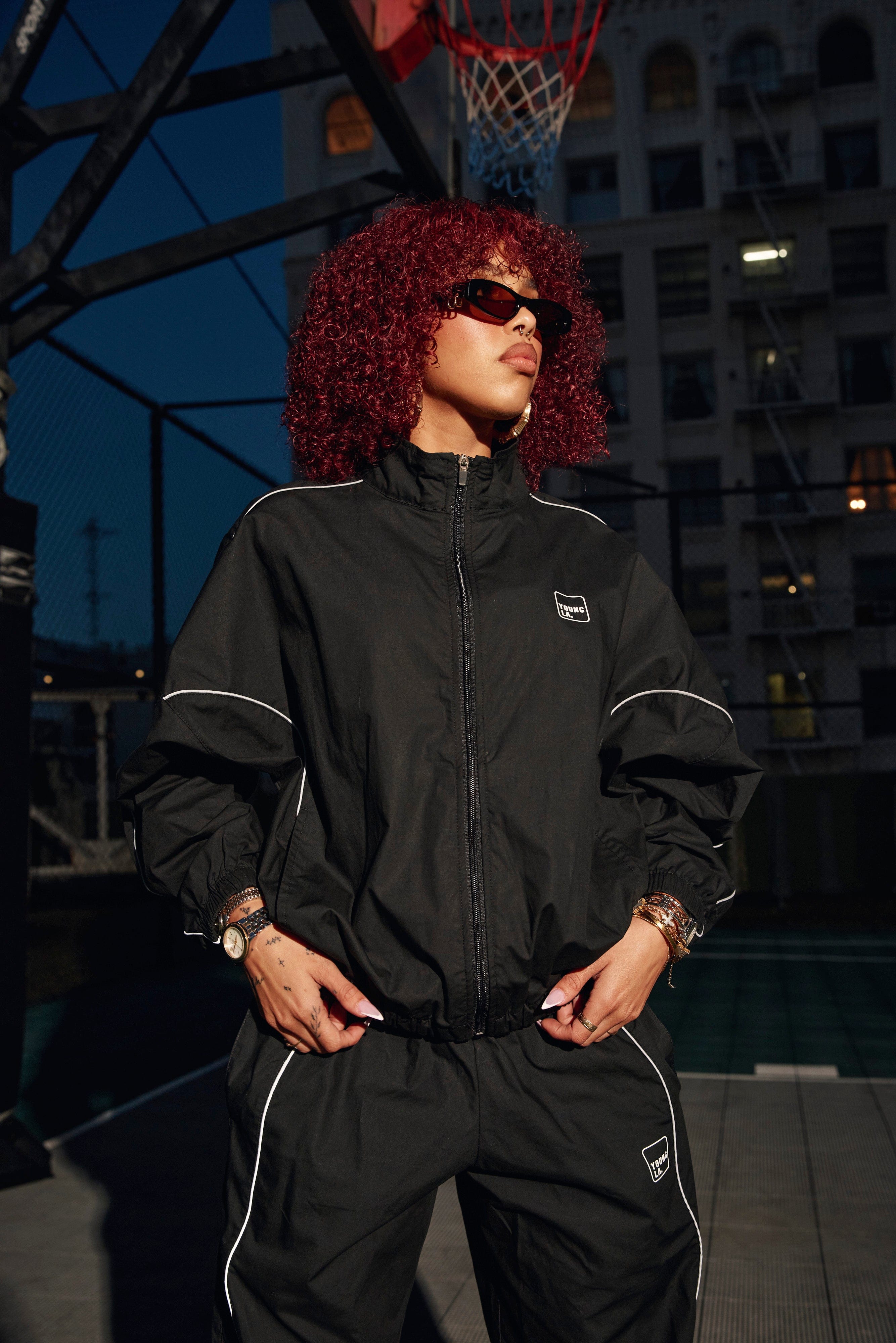 Back view of the Flash Womens Windbreaker Jacket with reflective accents.