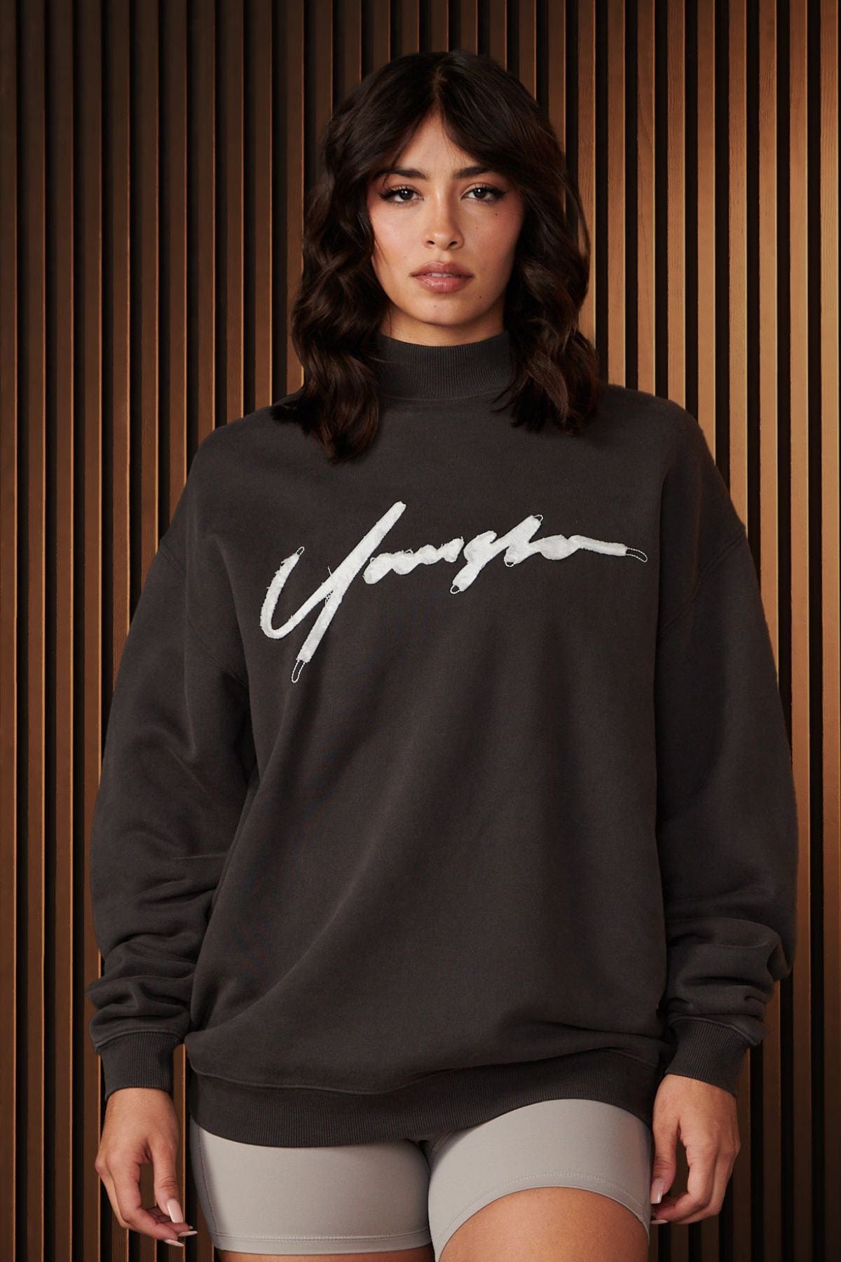 Front view of the Urban Crewneck sweatshirt highlighting the bold logo and cozy terry material
